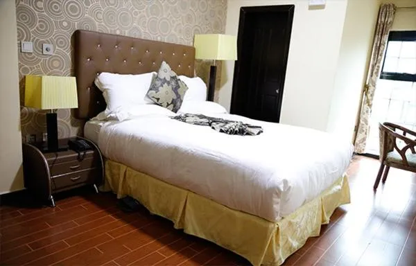 Bed in Afropolitan Hotel