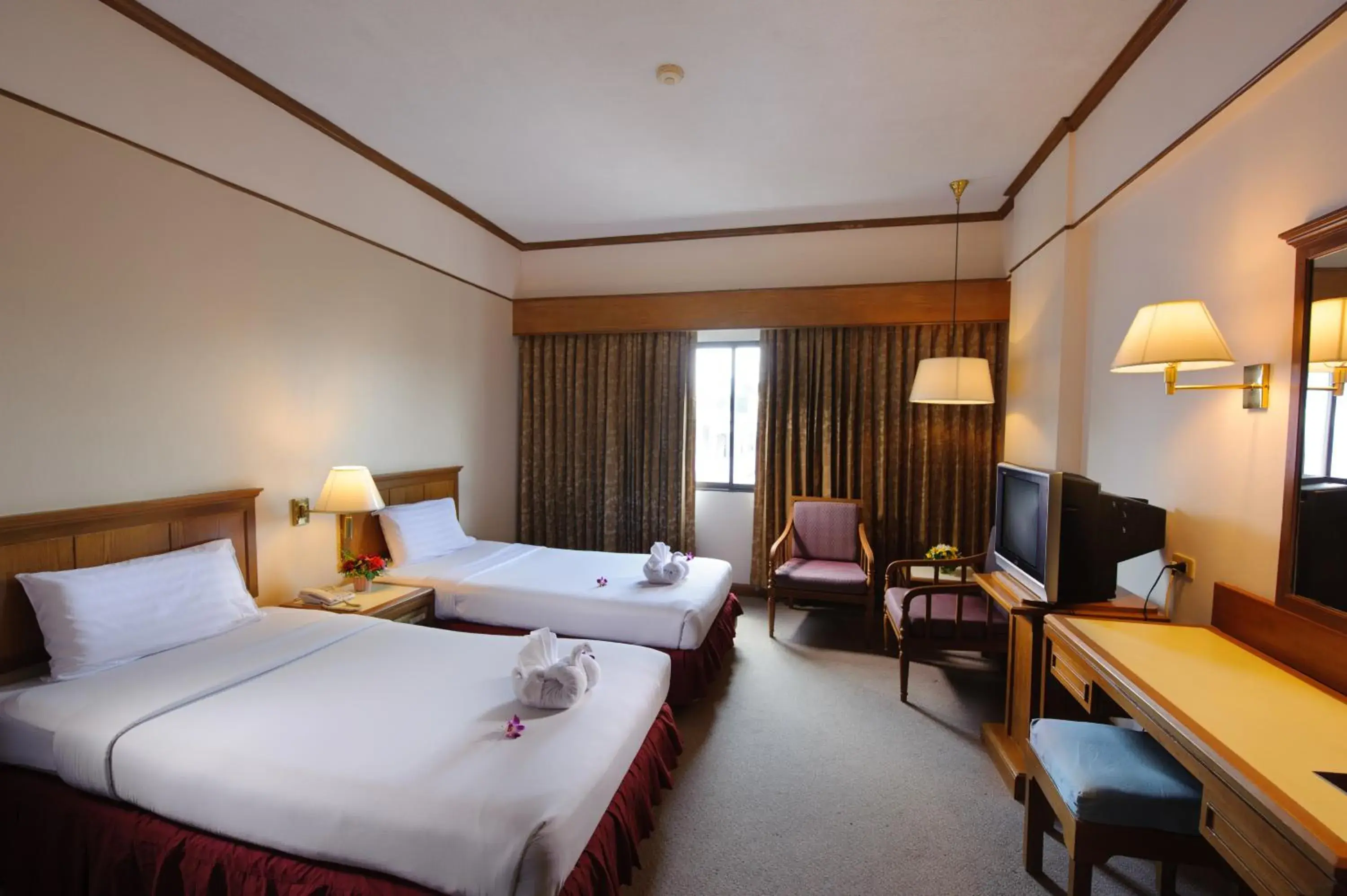 Communal lounge/ TV room, Bed in Betong Merlin Hotel Communal lounge/ TV room, Bed in Betong Merlin Hotel