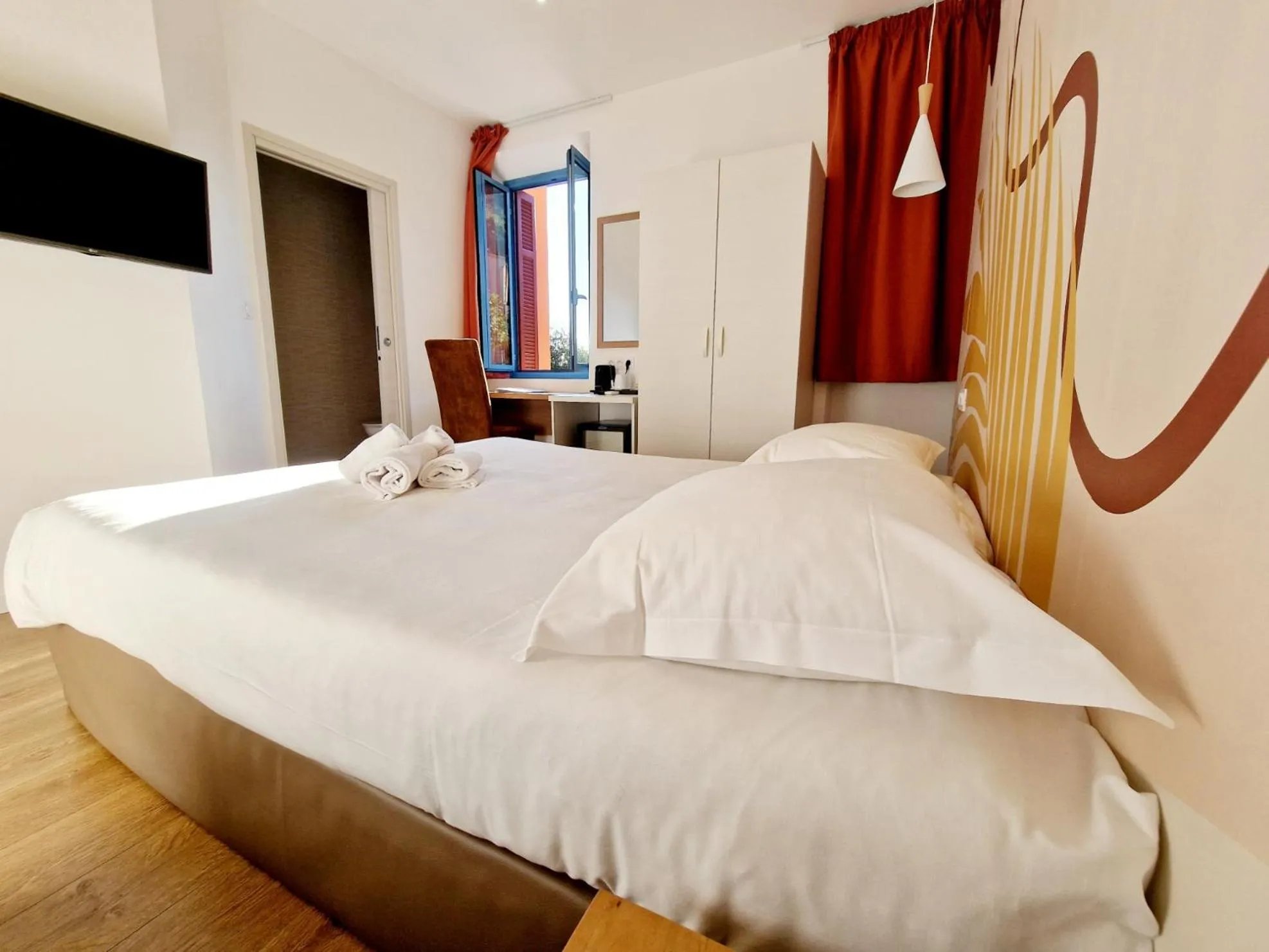 Bed in Hôtel Bella Vista