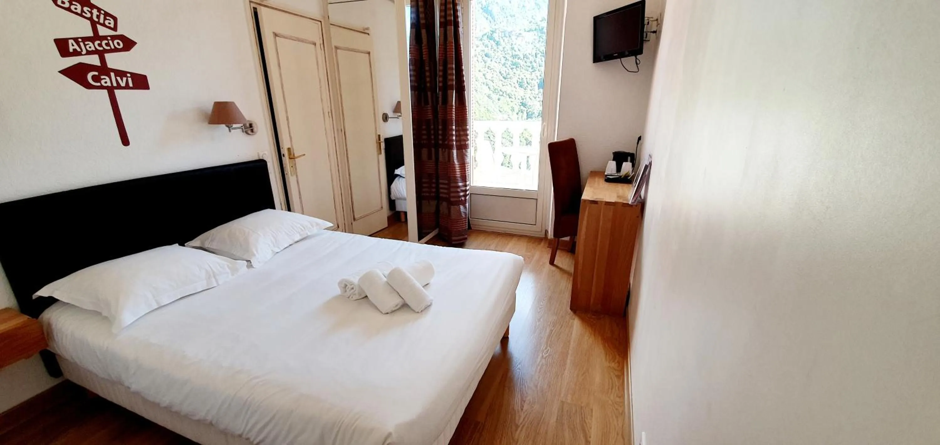 Bed in Hôtel Bella Vista