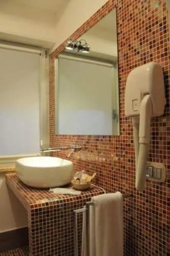 Bathroom in I Rocchi Hotel