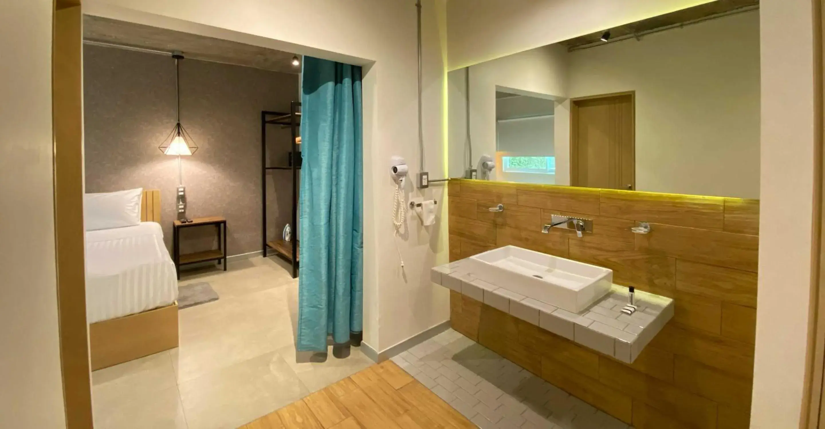 Bedroom in The Host Business Suites at WTC Bedroom in The Host Business Suites at WTC