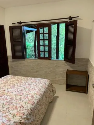 Bed in Pousada Chale Cana Brava