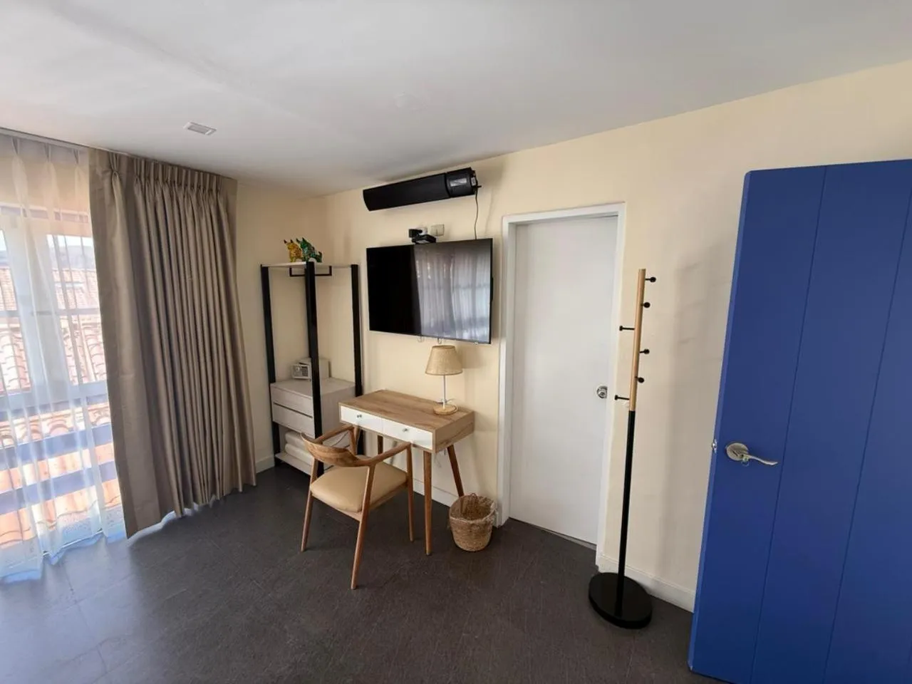 Communal lounge/ TV room in 7 Toritos Hotel Boutique by Hacienda