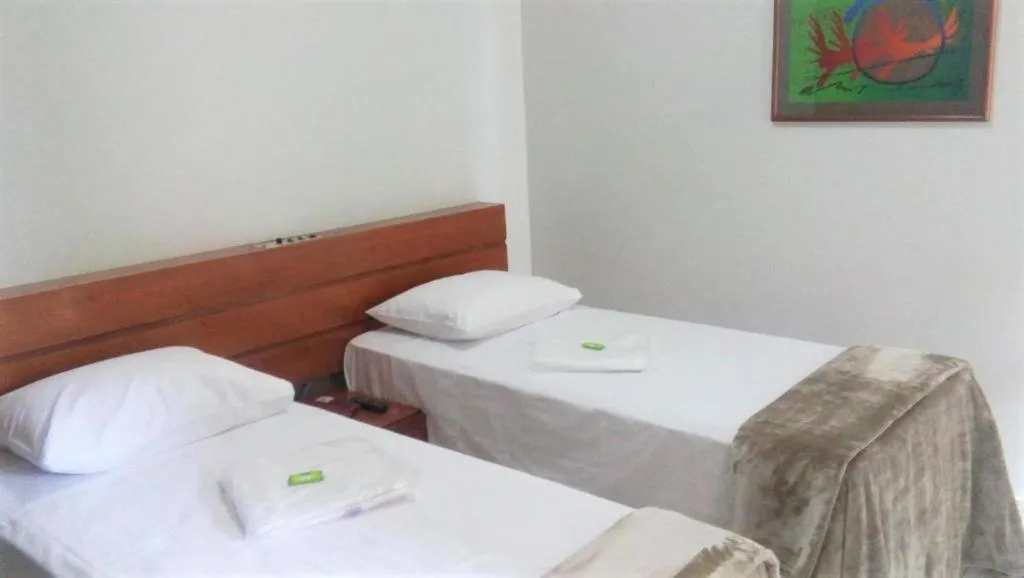 Bed in La Residence Flat Hotel