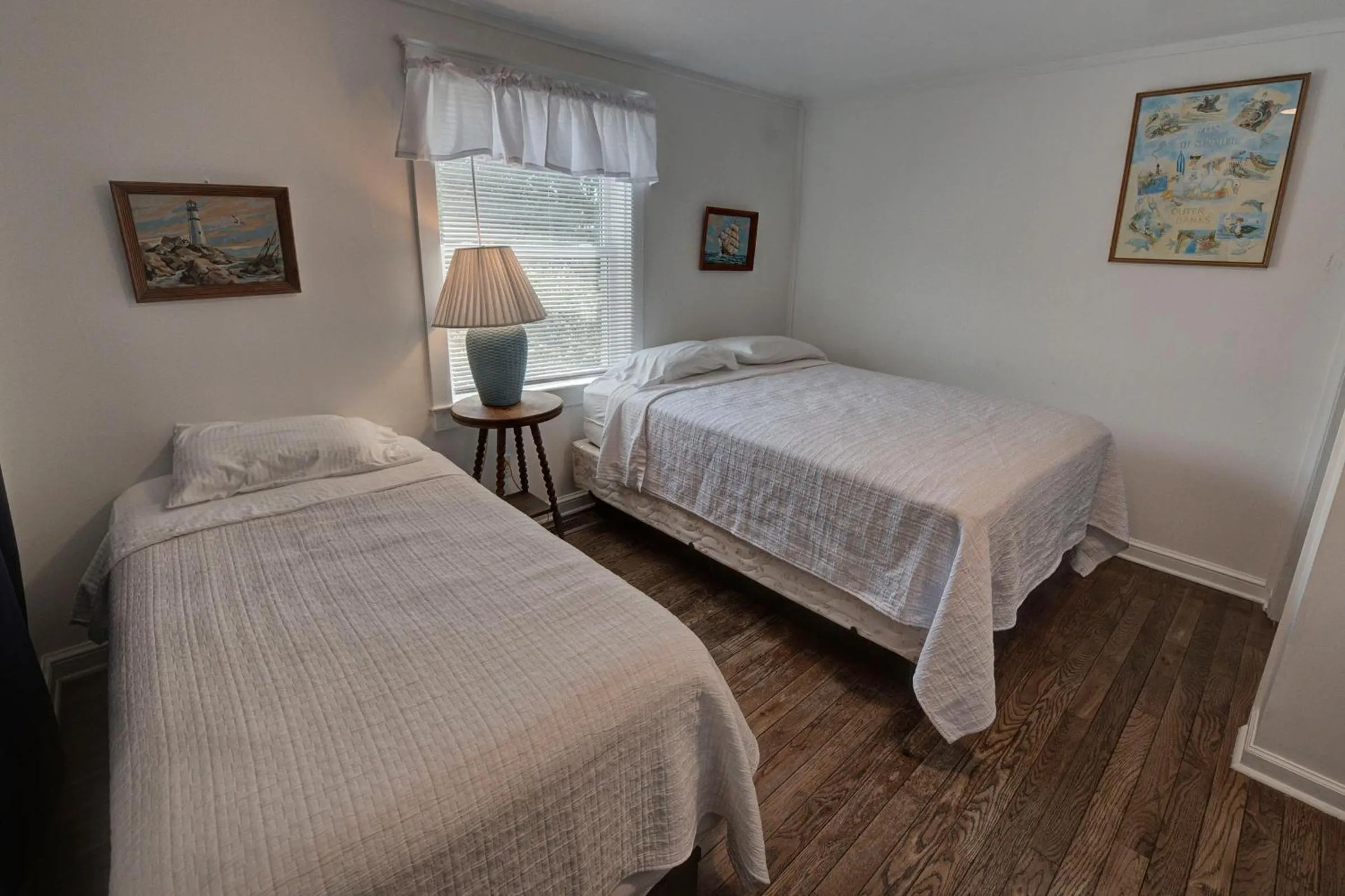 Bed in Outer Banks Motel - Village Accommodations