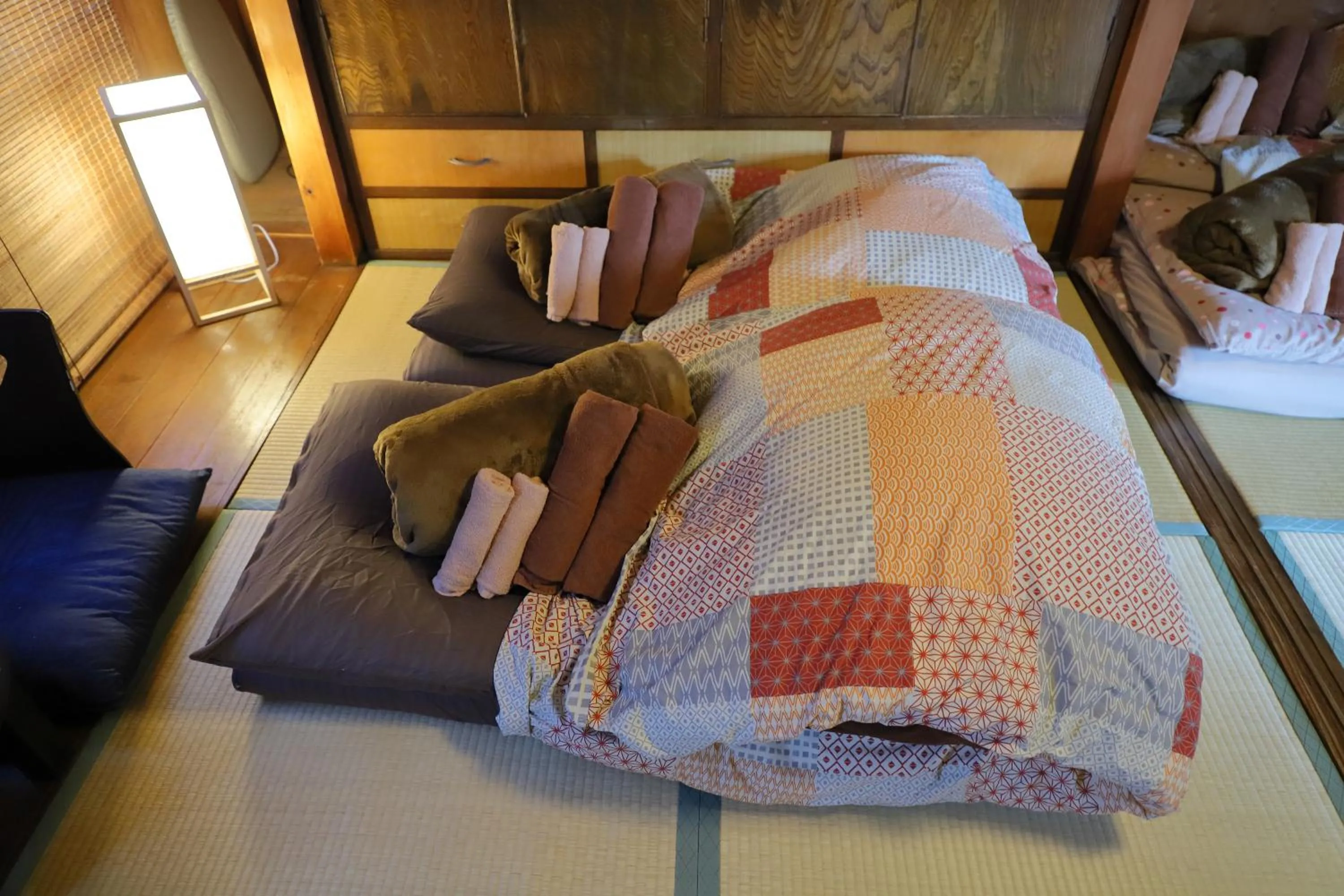 Bed in Oyado Sanjo Machiya