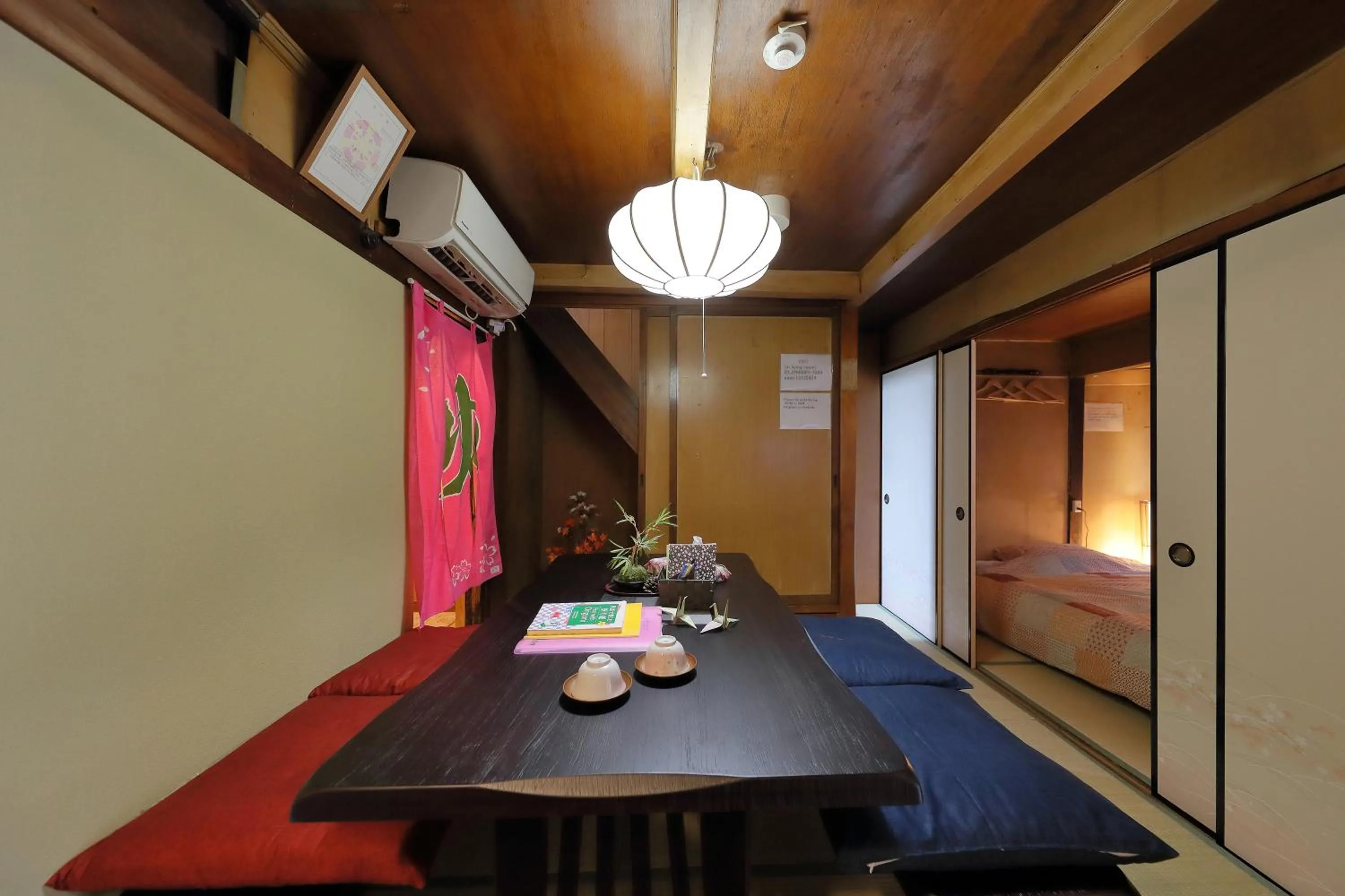 Living room, Bed in Oyado Sanjo Machiya