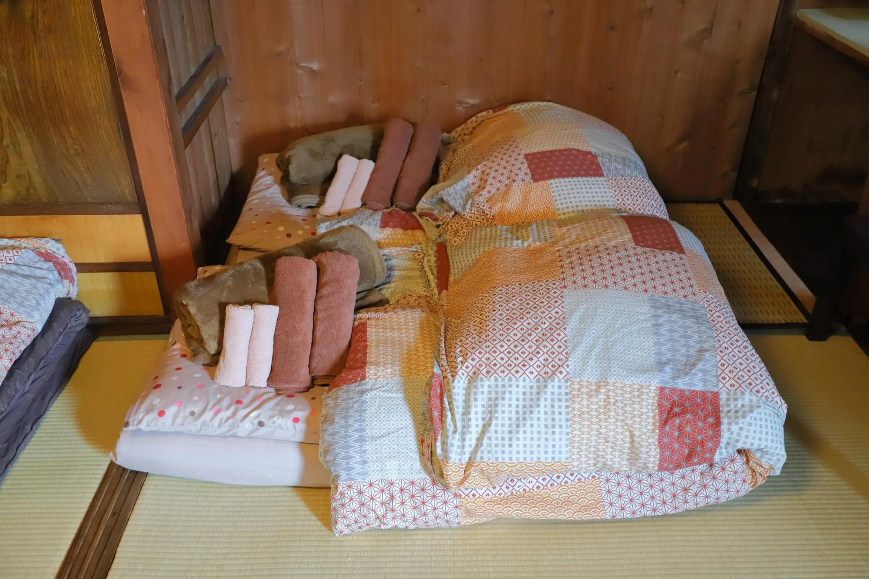 Bed in Oyado Sanjo Machiya