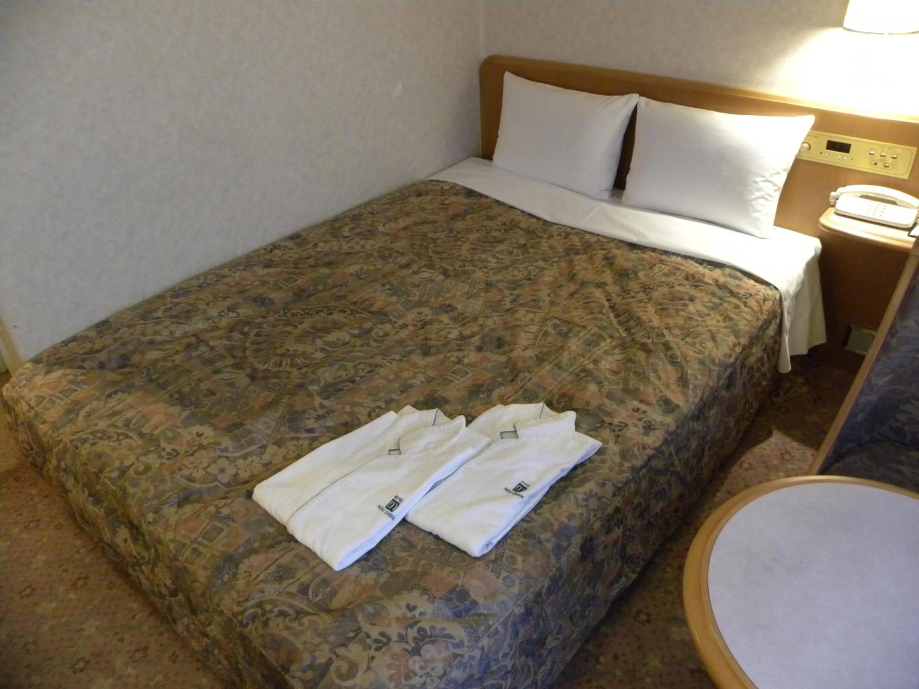 Photo of the whole room, Bed in Hotel New Green Okachimachi