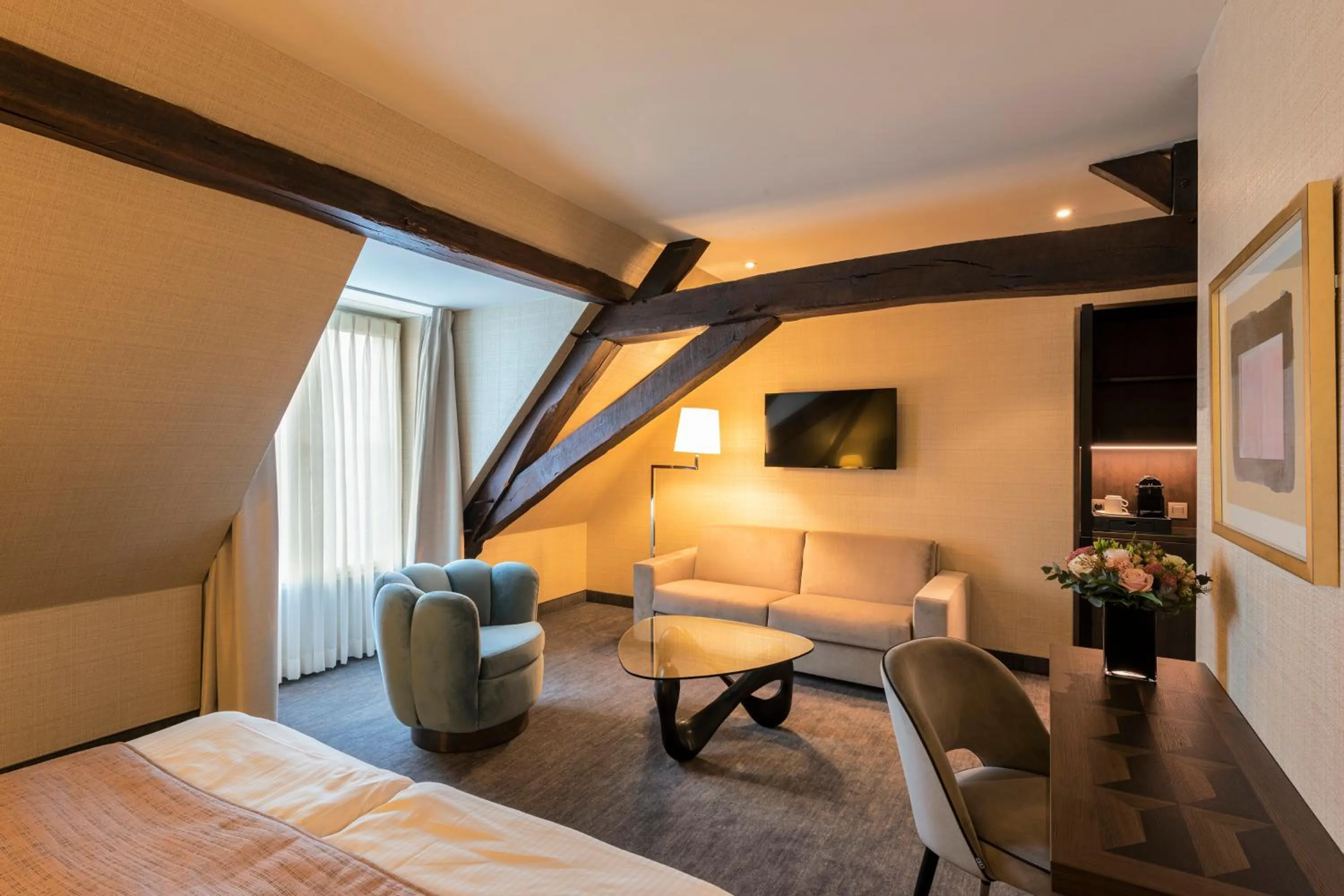 Seating area, Bed in Dukes' Arches Brugge - by Dukes' Hotel Collection