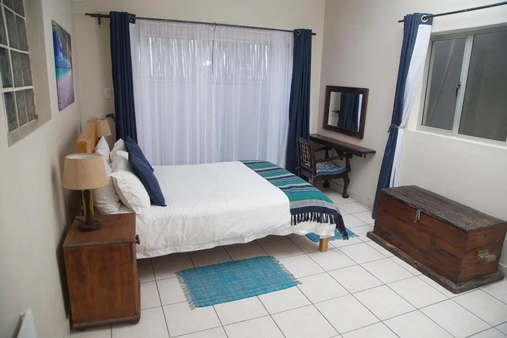 Bed in Ansteys Beach Self Catering Apartments