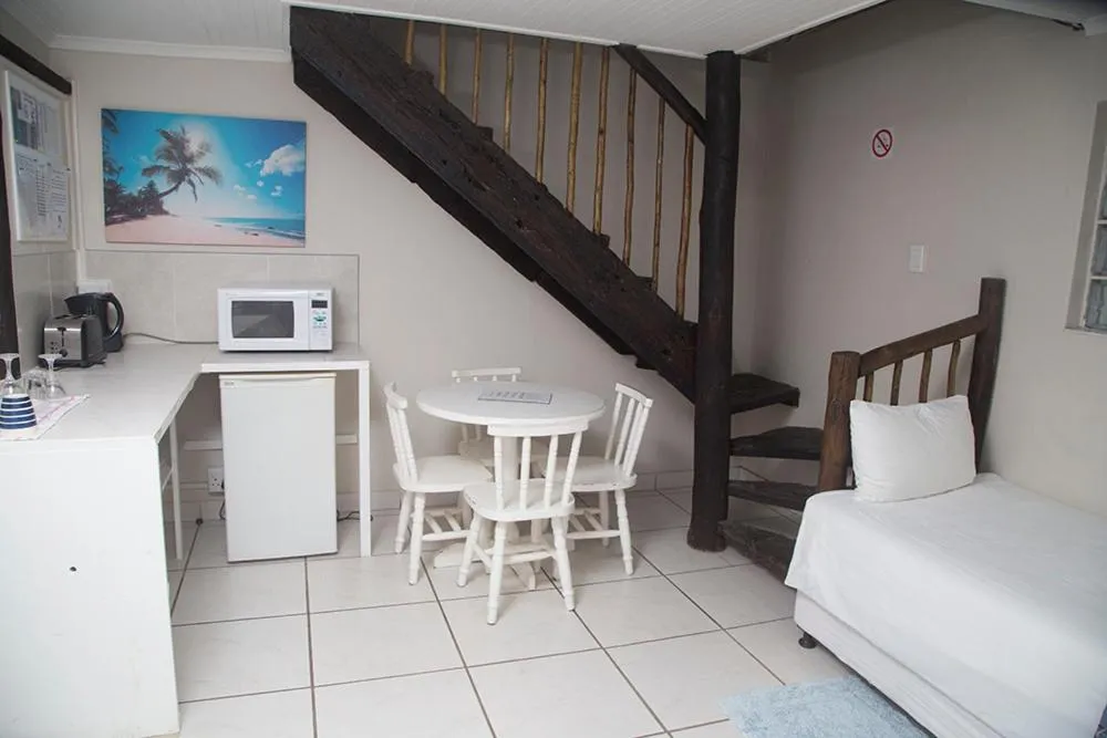 Bed in Ansteys Beach Self Catering Apartments