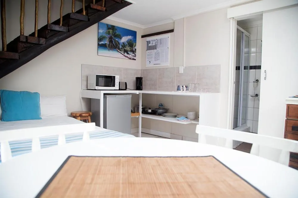 Bed in Ansteys Beach Self Catering Apartments