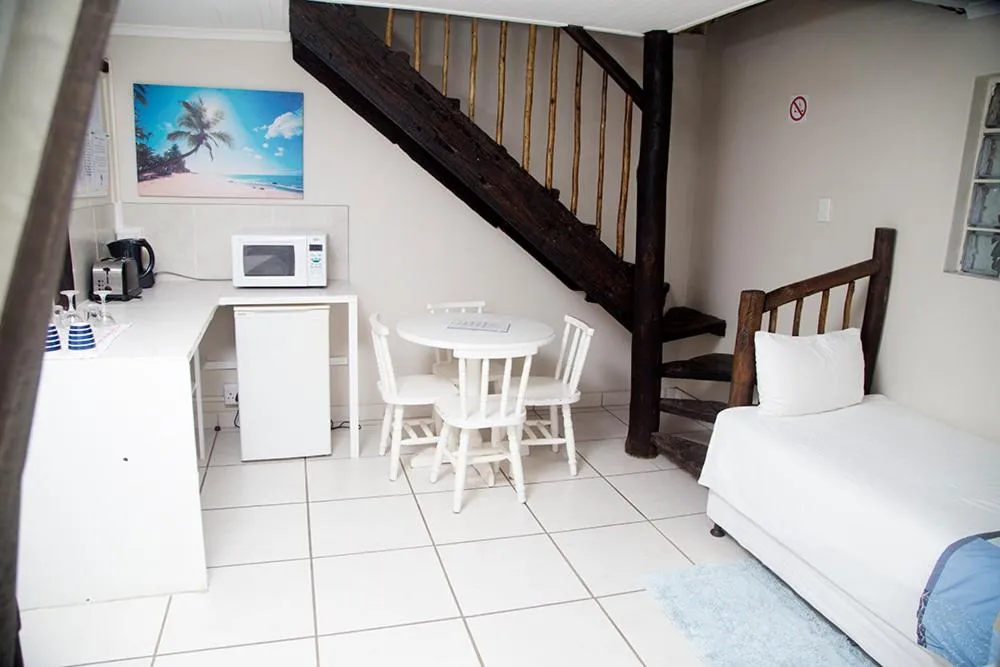 Bed in Ansteys Beach Self Catering Apartments