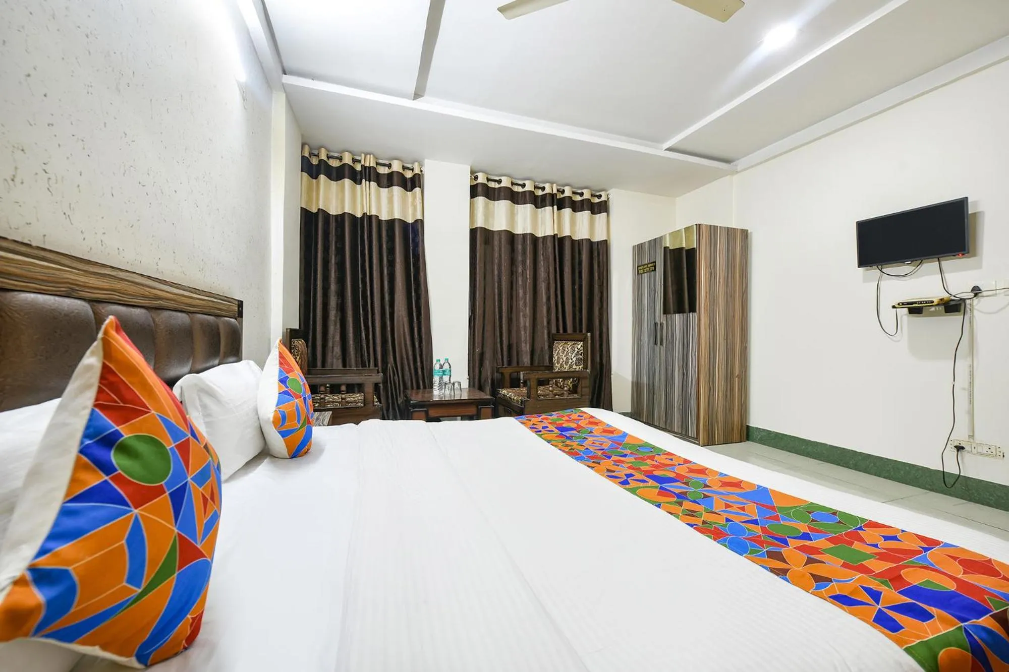 Bed in FabHotel Ess Pee Grand