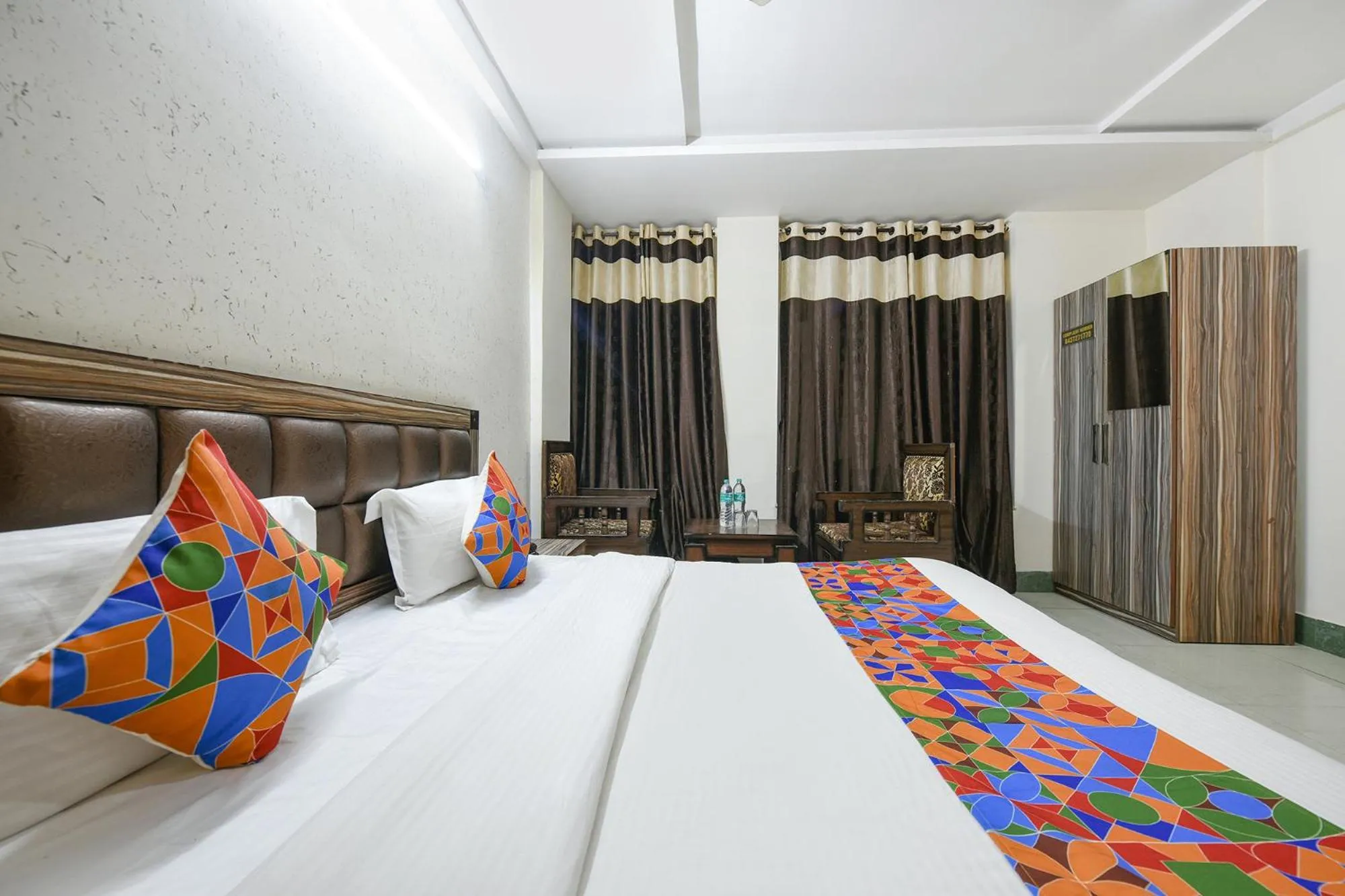 Bed in FabHotel Ess Pee Grand