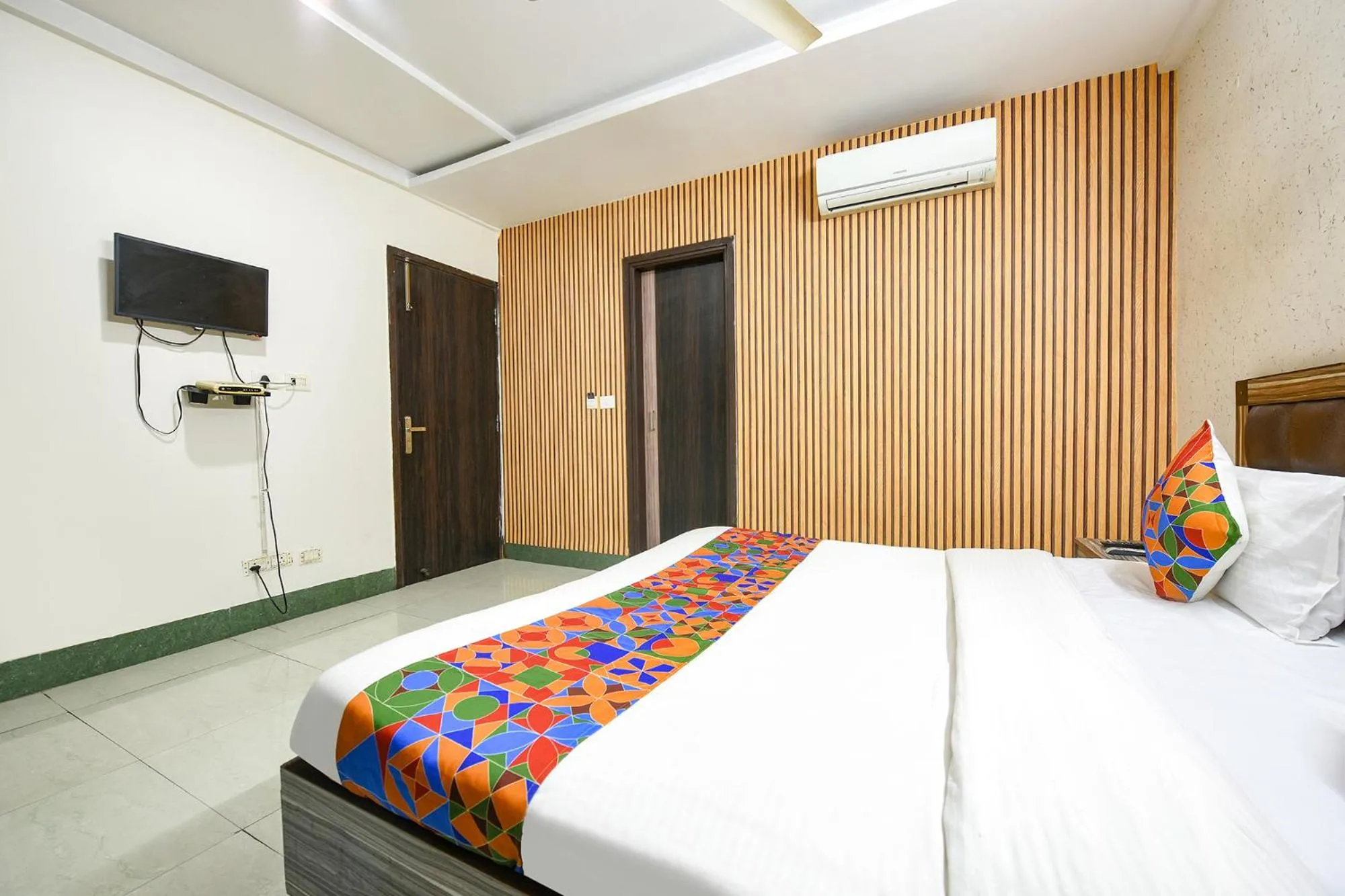 Bed in FabHotel Ess Pee Grand