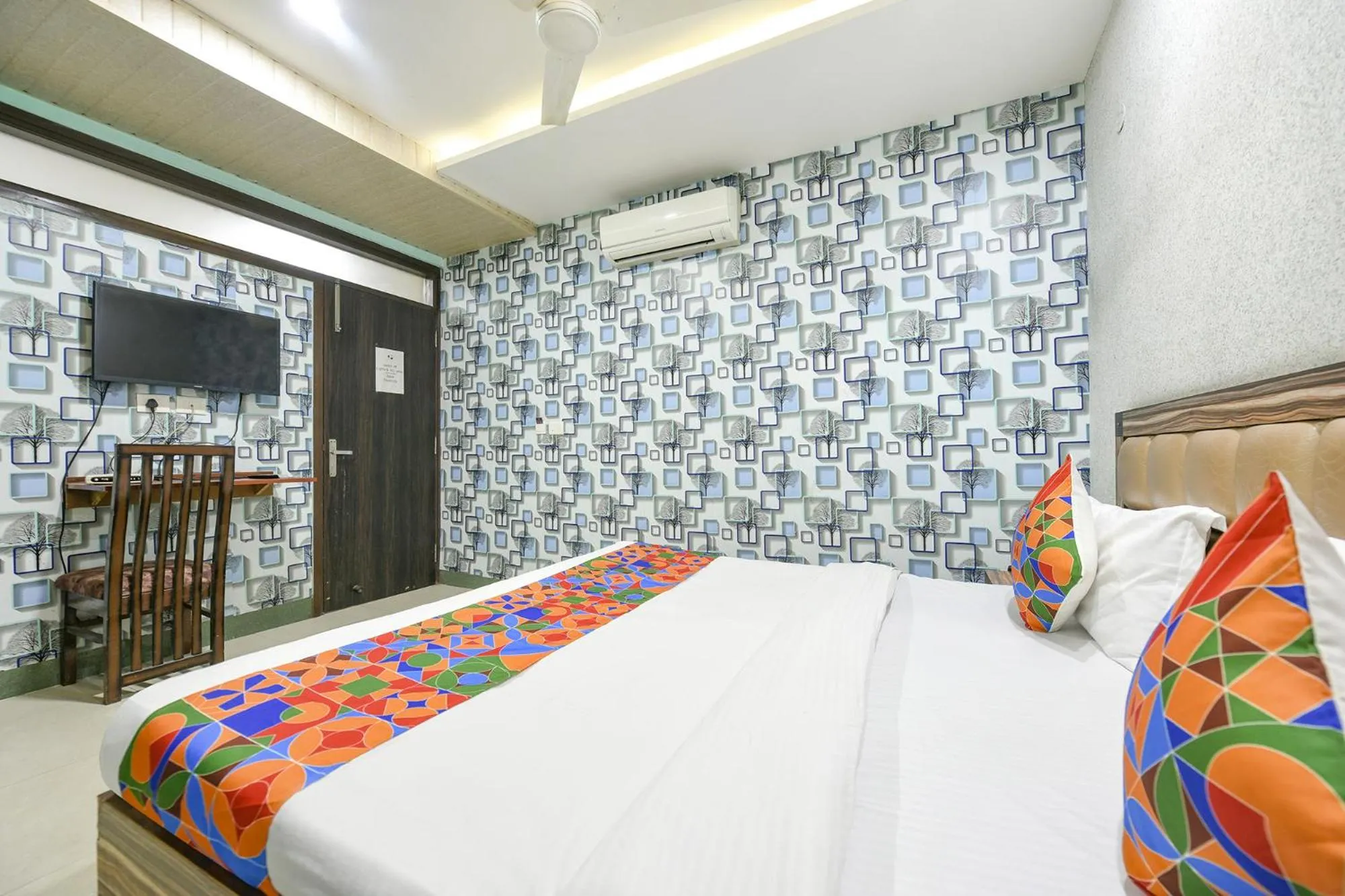 Bed in FabHotel Ess Pee Grand