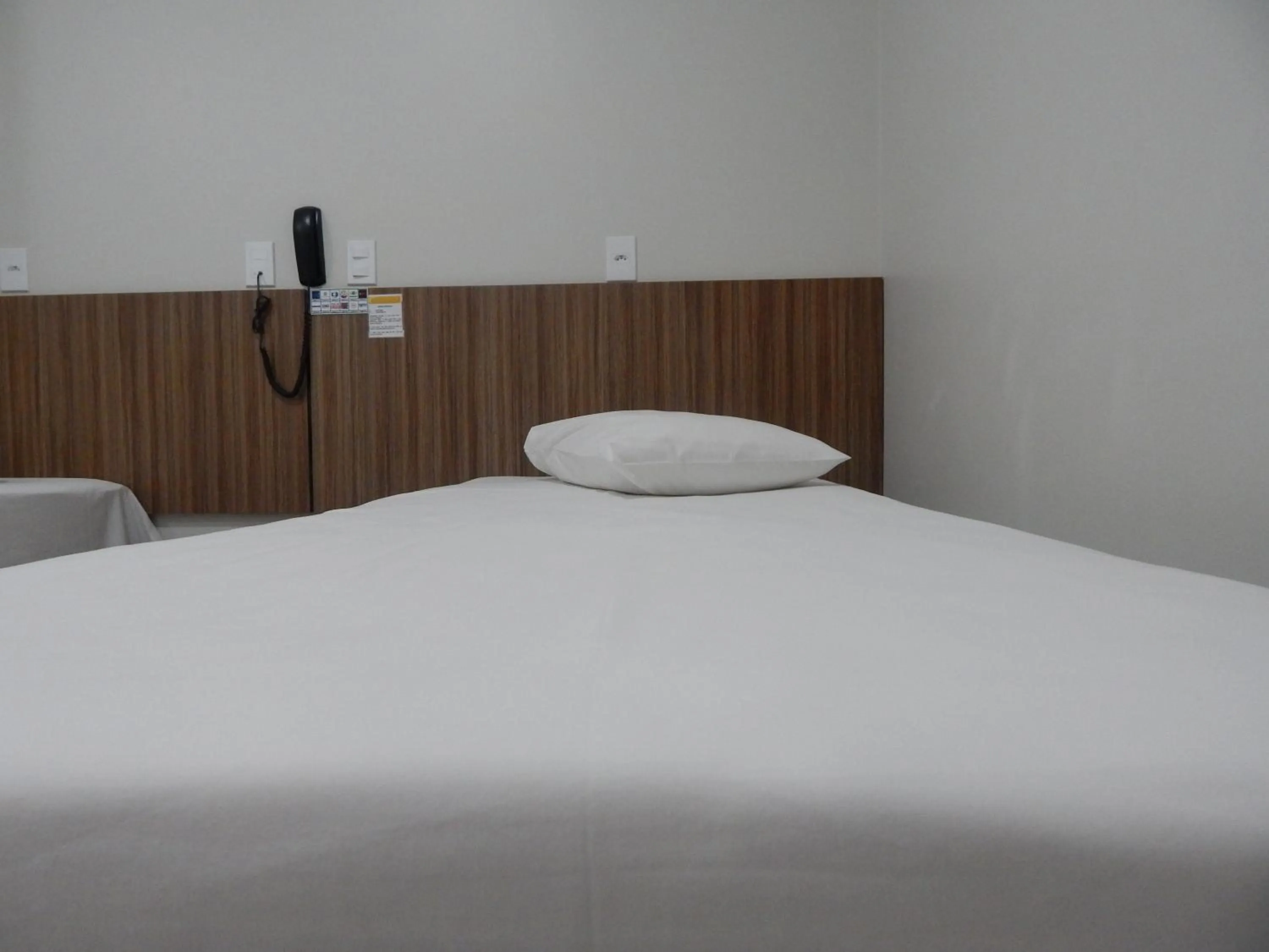 Bed in Hotel Mandino