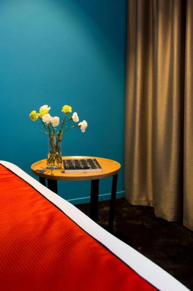 Bedroom in Chapeau Rouge par William Frachot - Hôtel Espace Bien-être & Restaurant étoilé