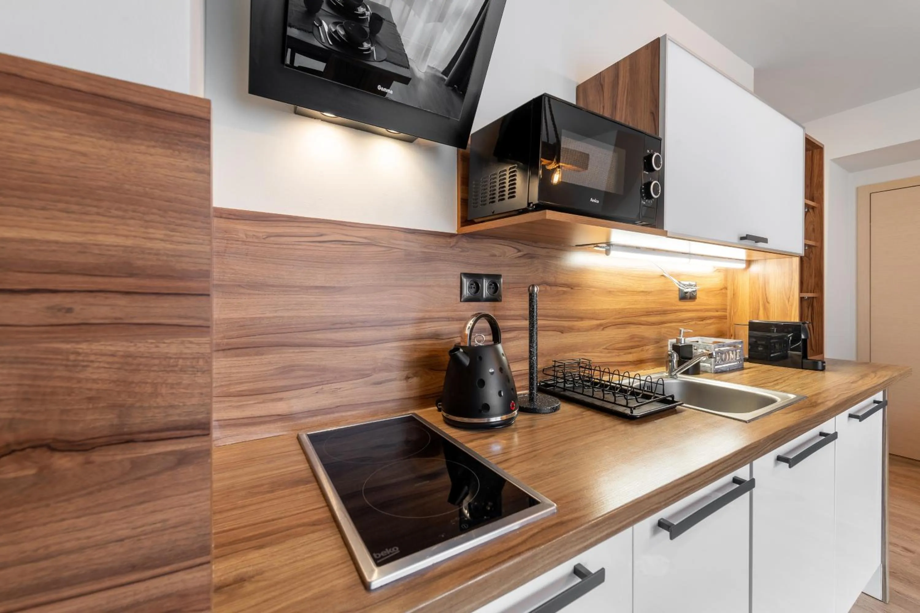 Kitchen or kitchenette in Bory6a Apartamenty & Free Parking