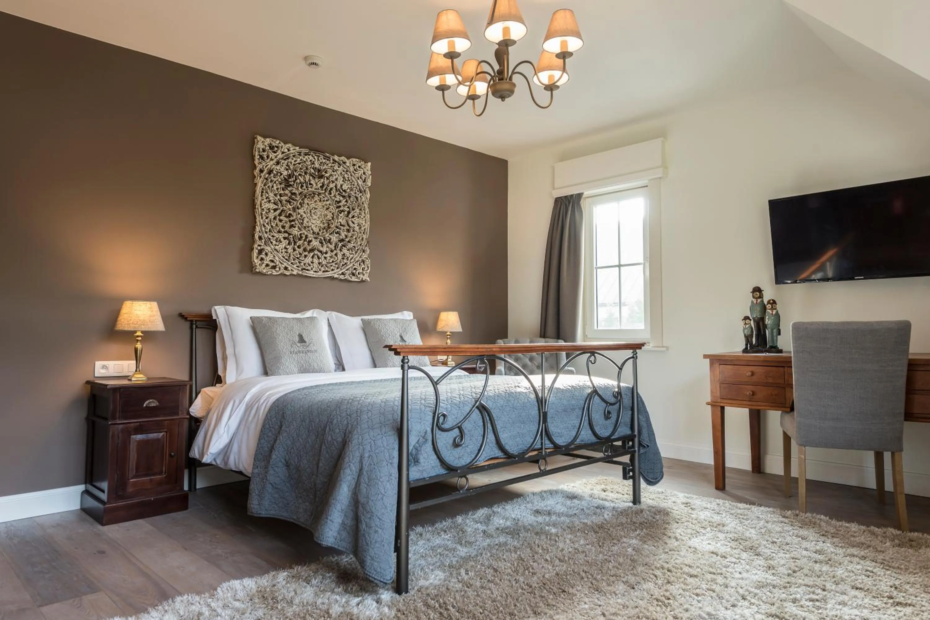 Bed in Charmehotel Klokkenhof