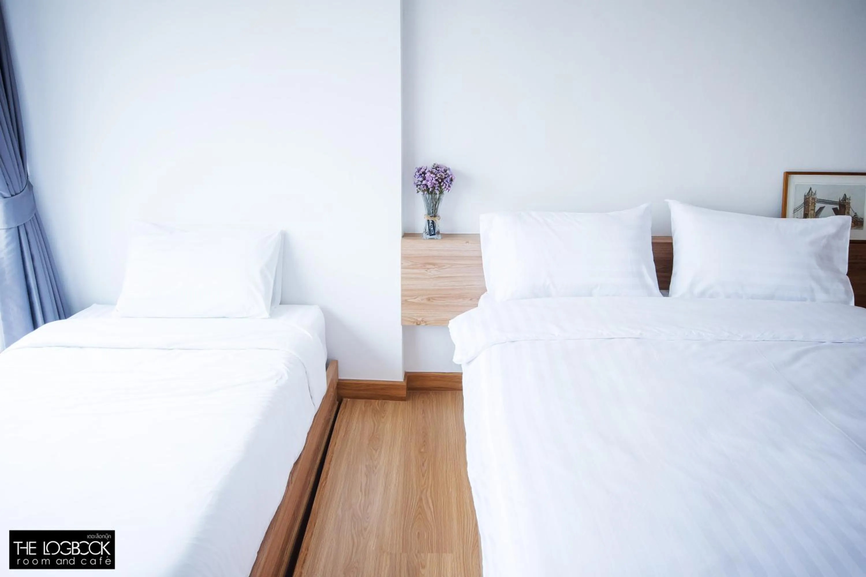 Staff, Bed in The LogBook Room and Cafe'