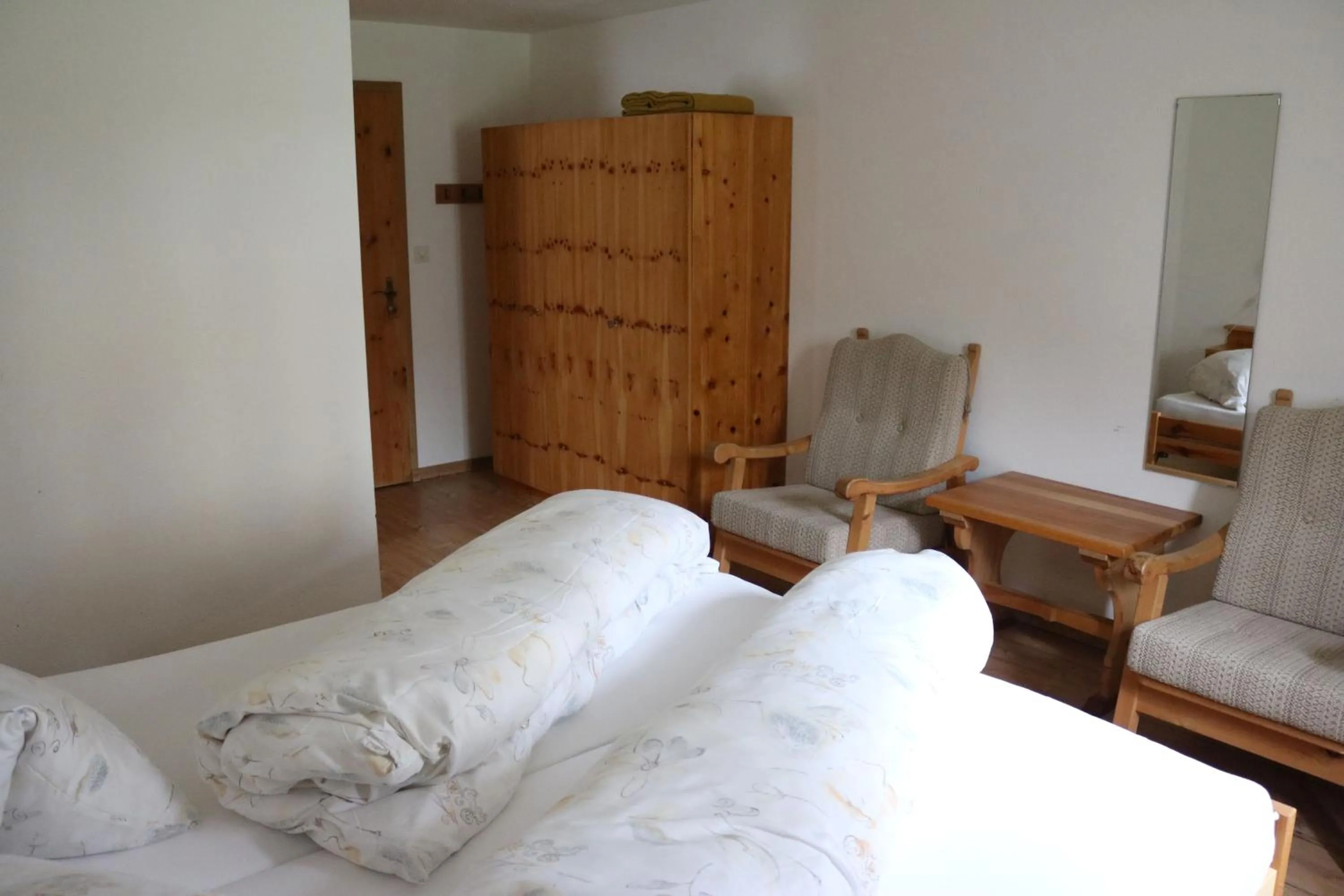 Living room, Bed in Chasa Randulina