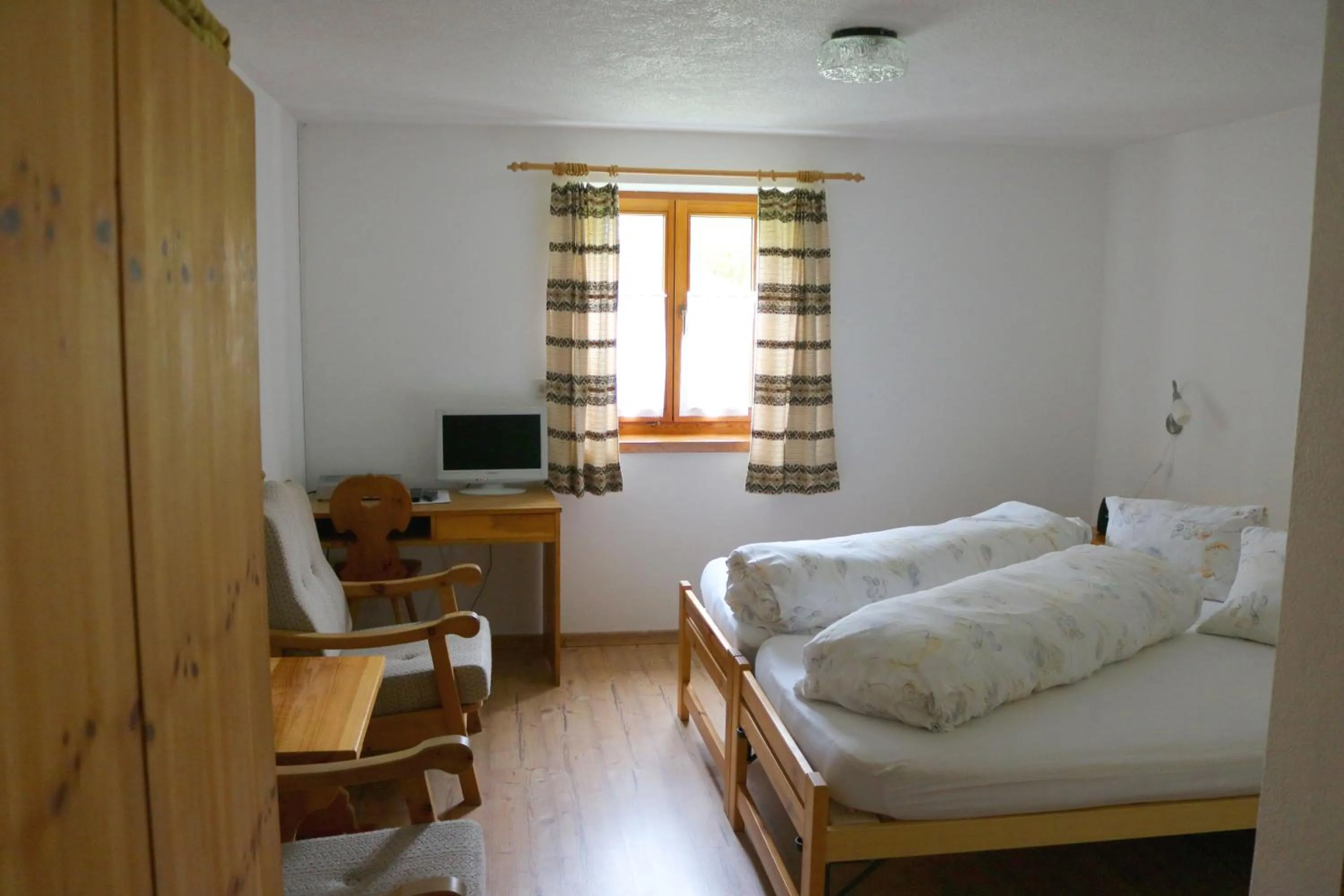 Living room, Bed in Chasa Randulina