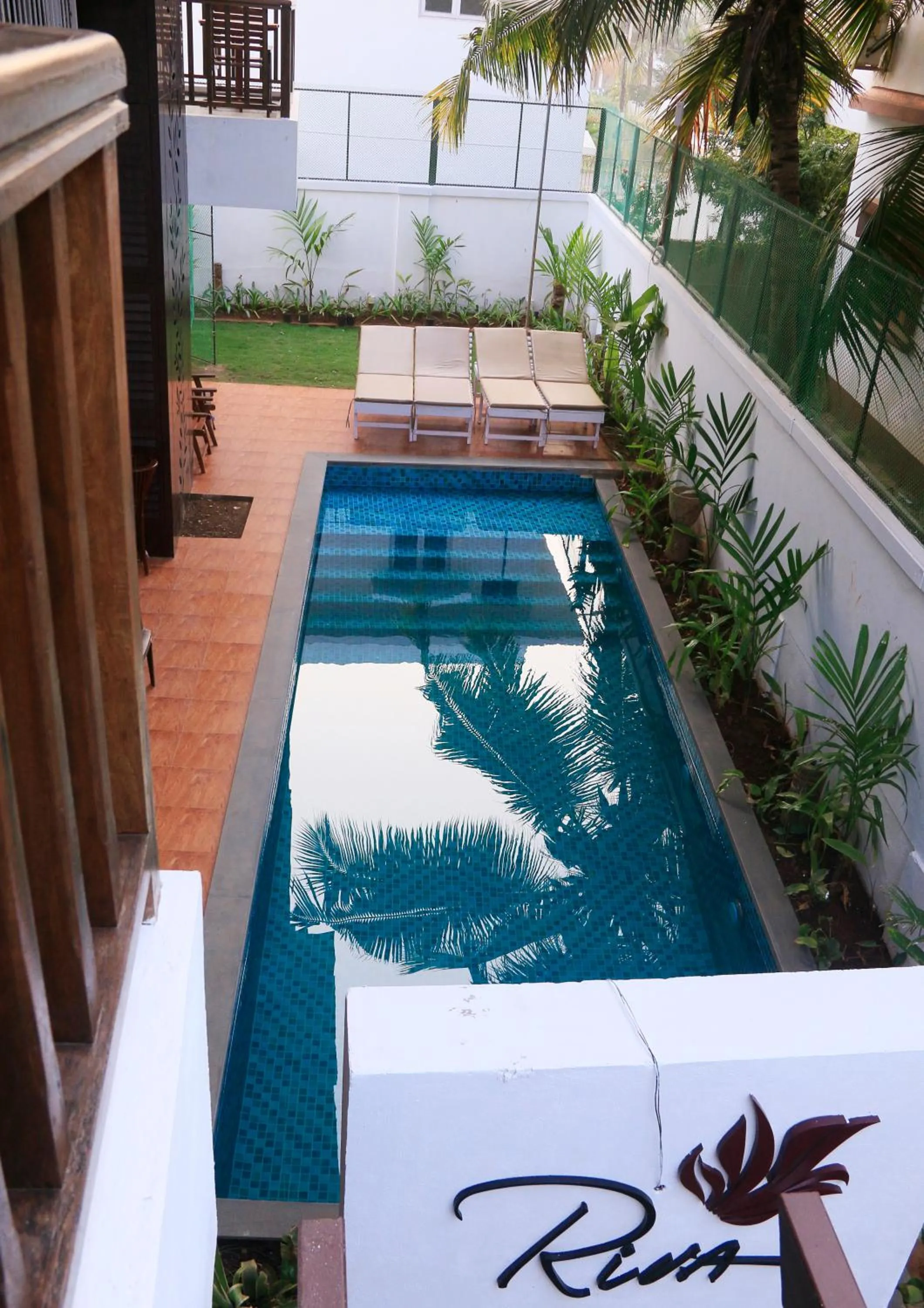 Swimming pool in Riva Boutique Apartments