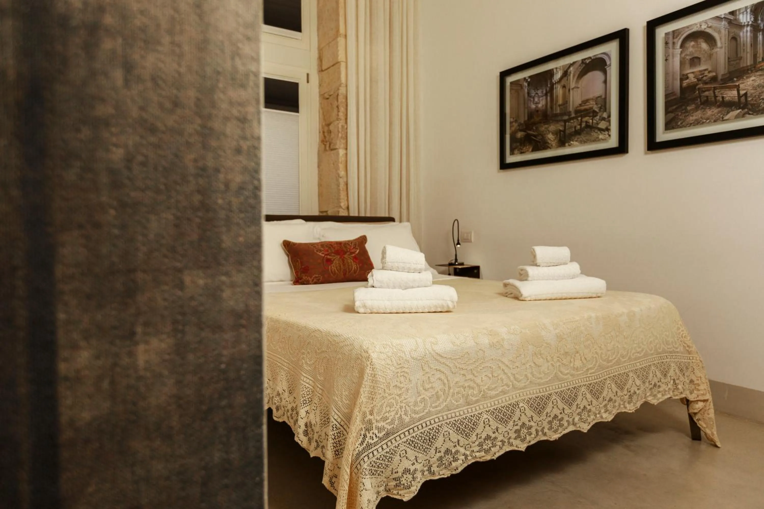 Bed in Embrace Sicily Guest House