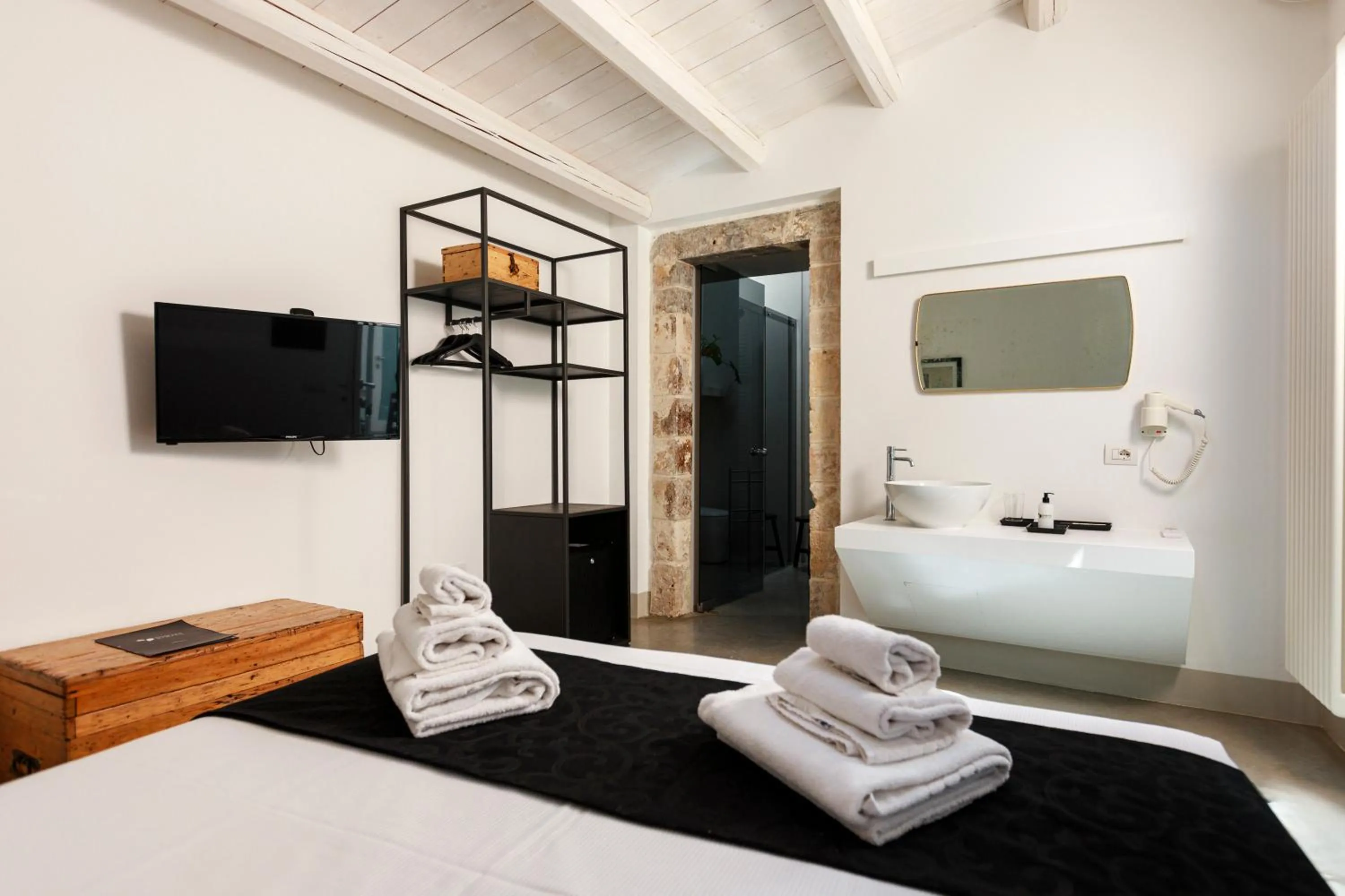 Bed in Embrace Sicily Guest House
