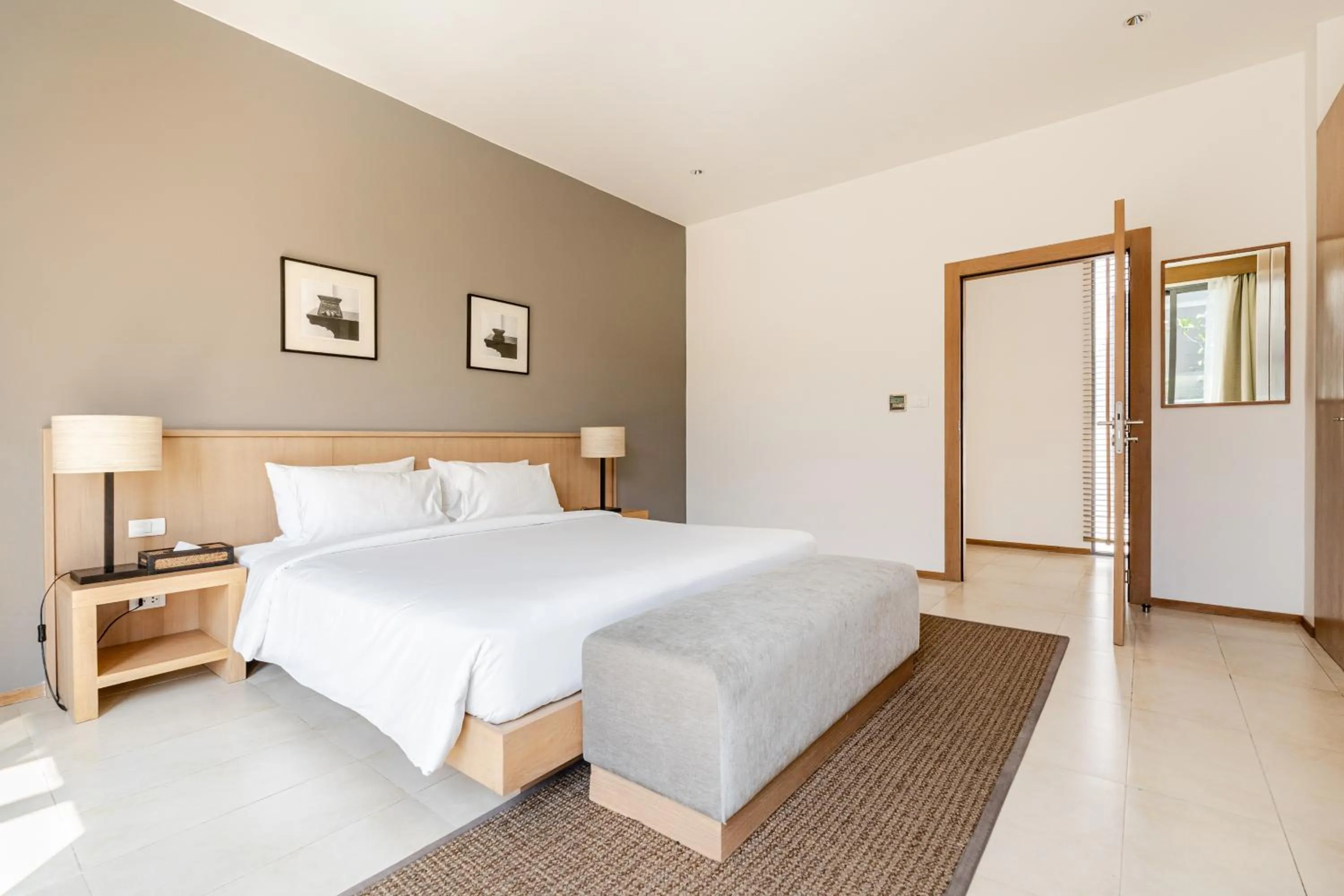 Bed in CASABAY Luxury Pool Villas by STAY