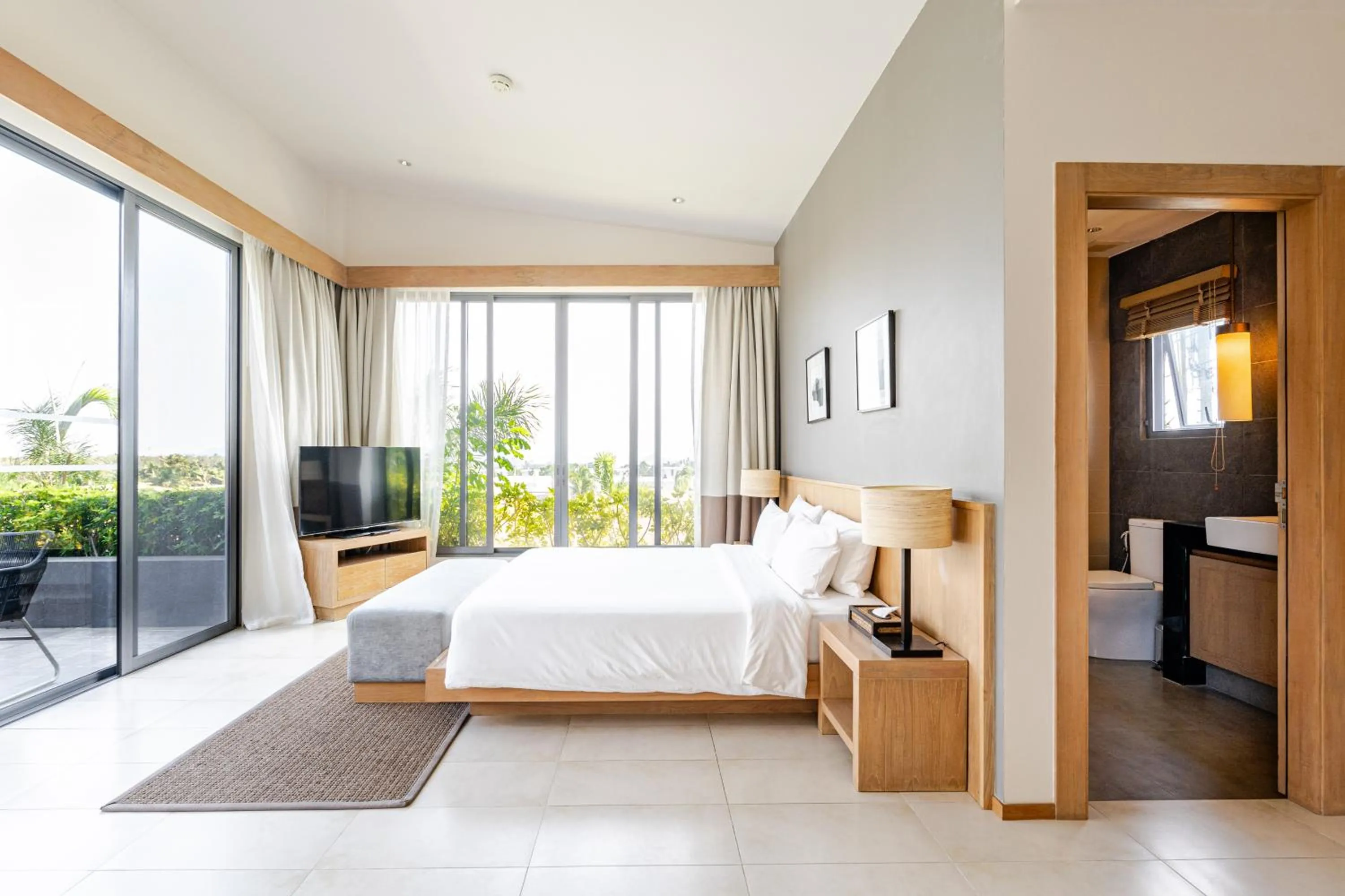 Bed in CASABAY Luxury Pool Villas by STAY
