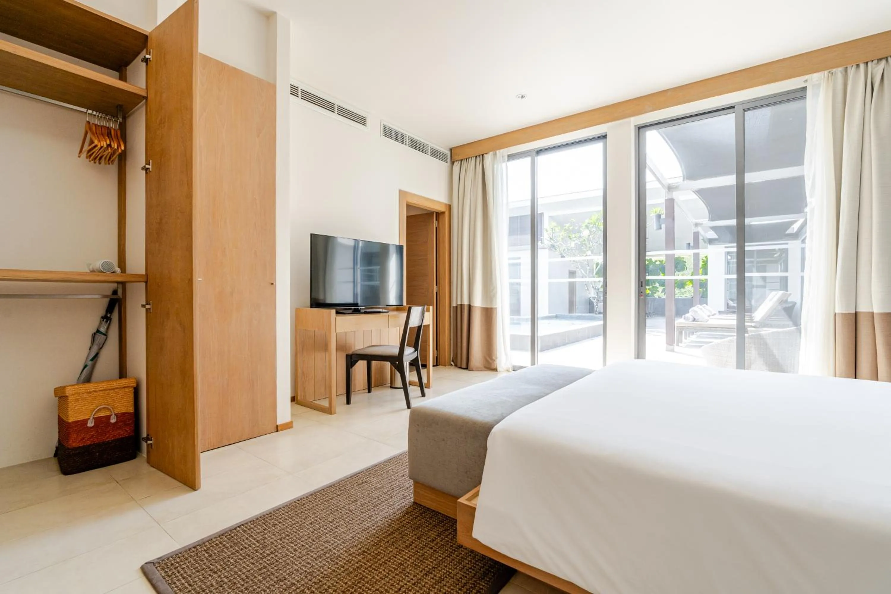 Bed in CASABAY Luxury Pool Villas by STAY