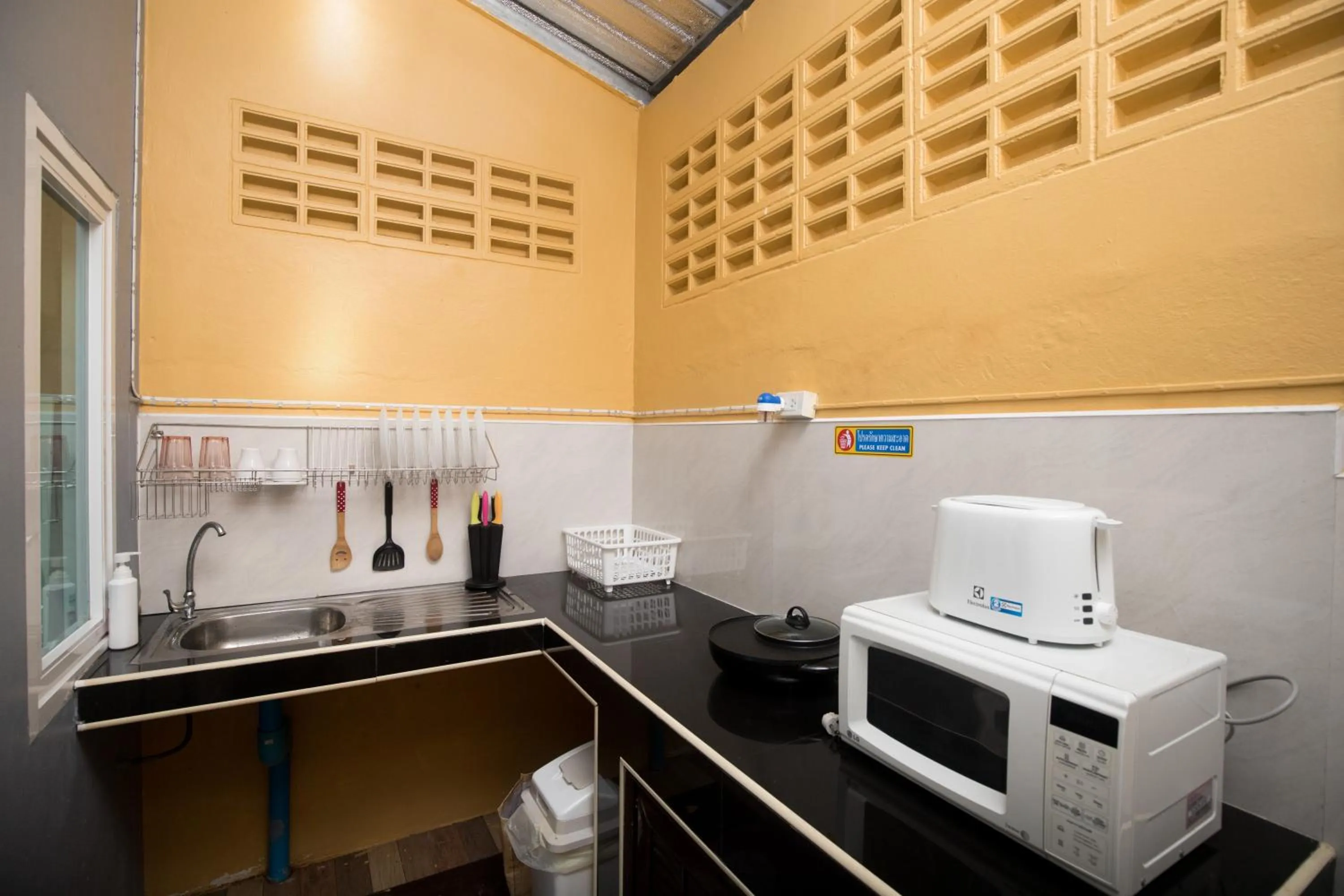 Communal kitchen in DKaYa Hostel
