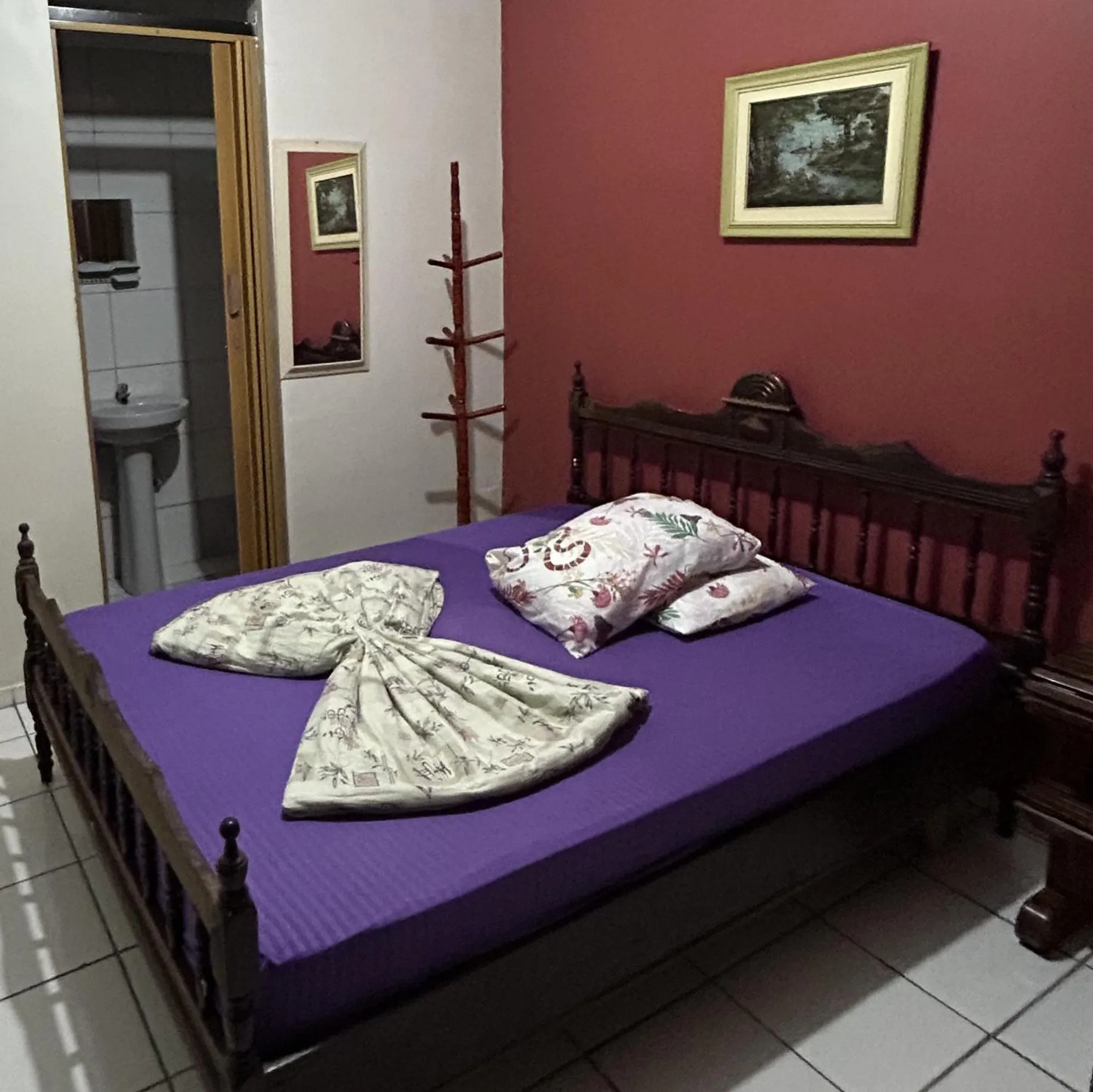 Bed in Pousada Orquidário