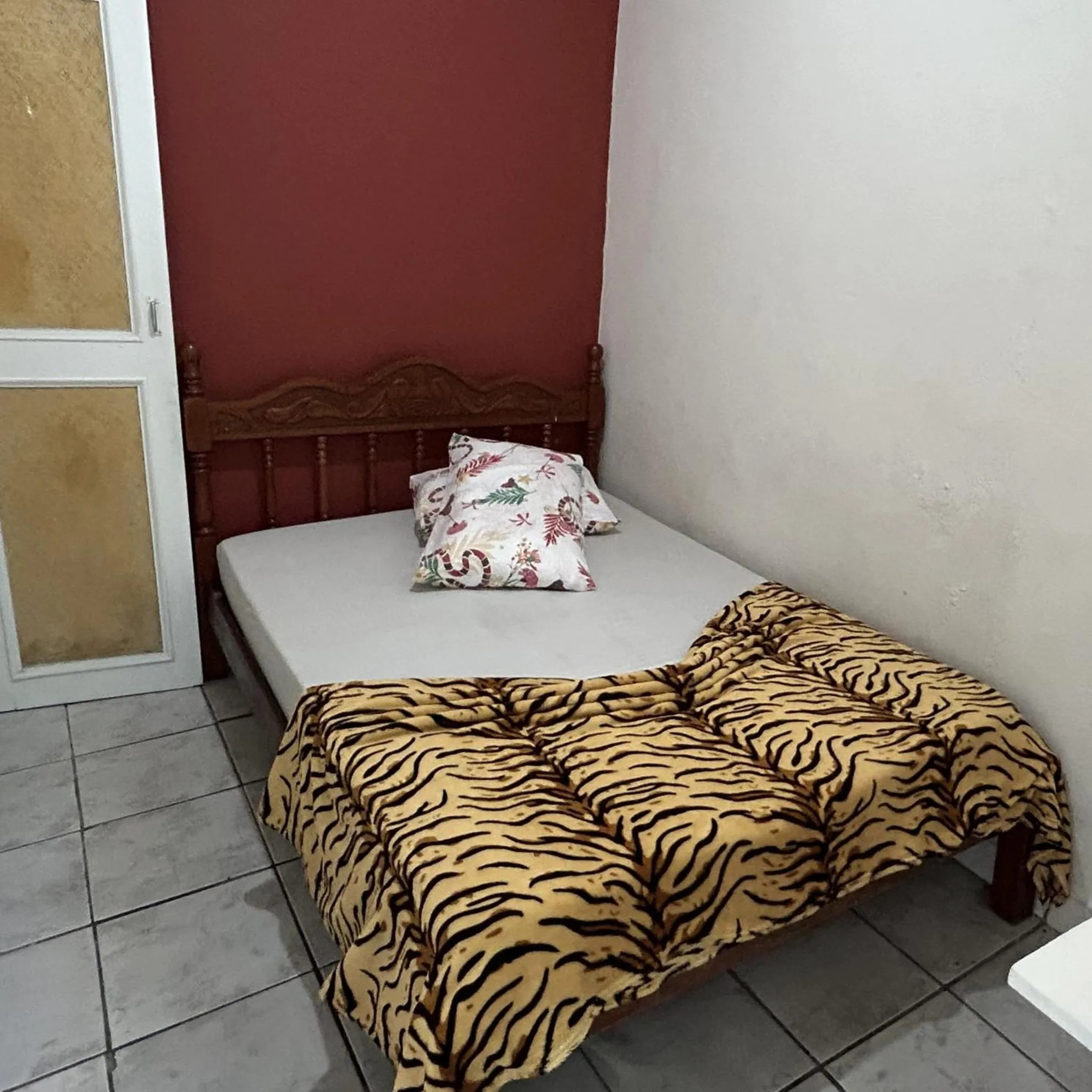 Bed in Pousada Orquidário