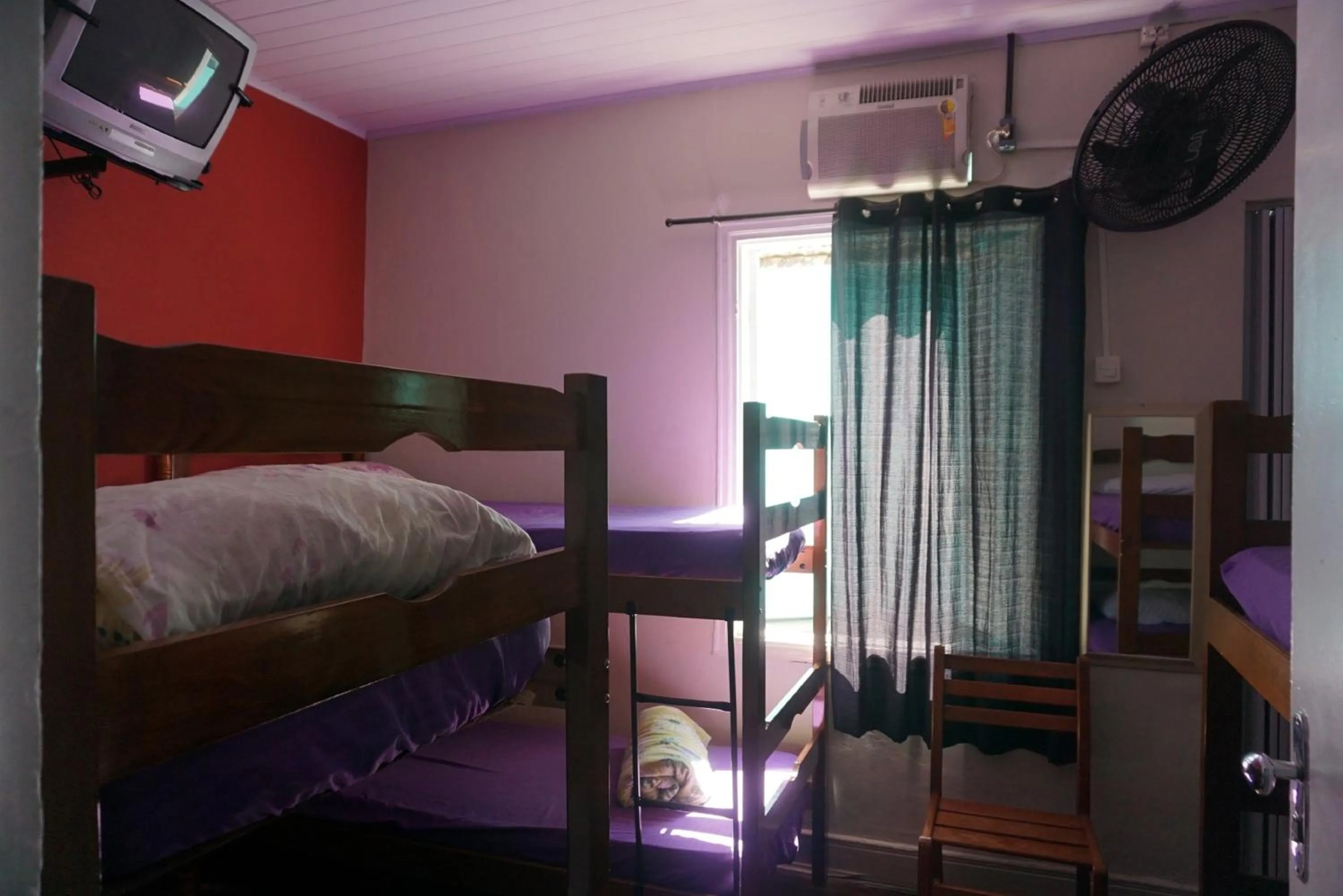 Bed in Pousada Orquidário