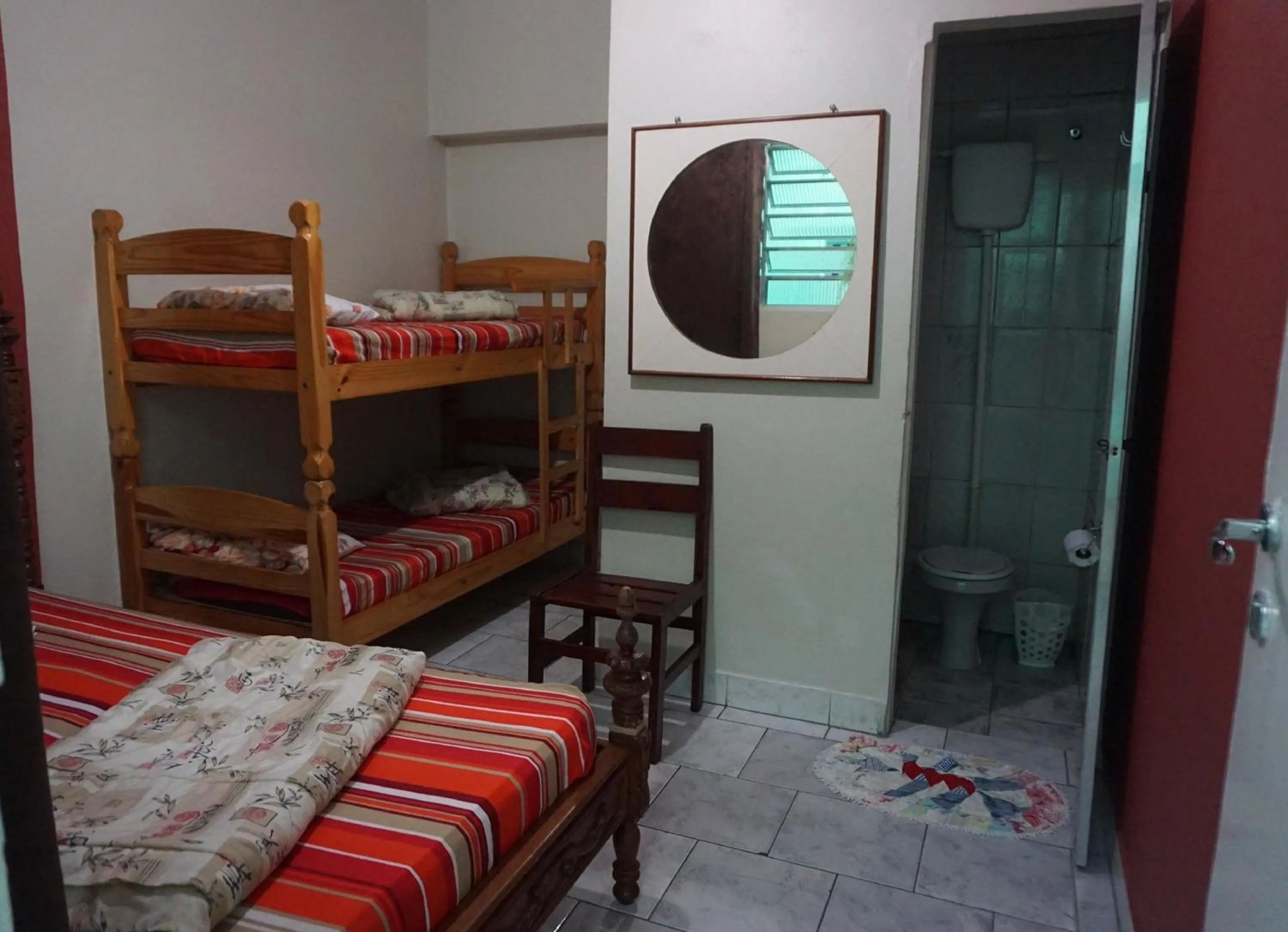 Bed in Pousada Orquidário