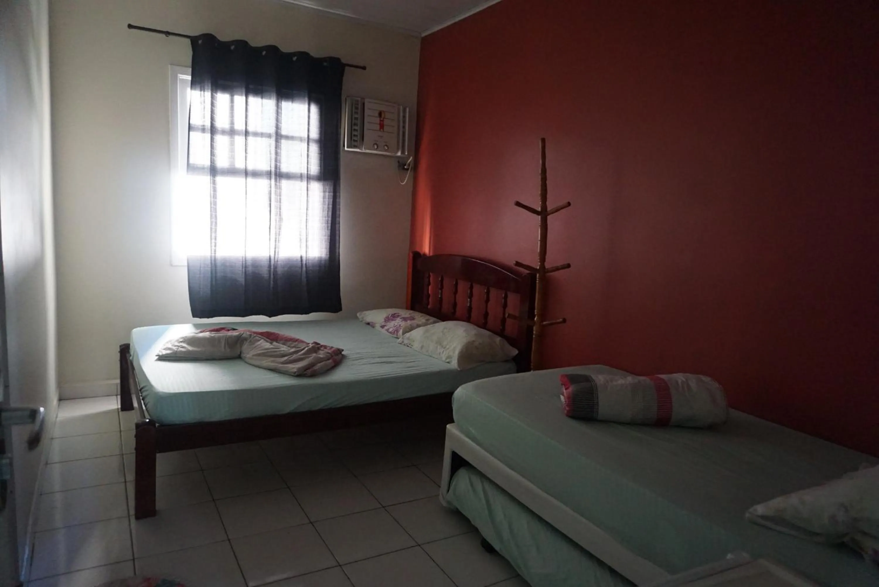 Bed in Pousada Orquidário