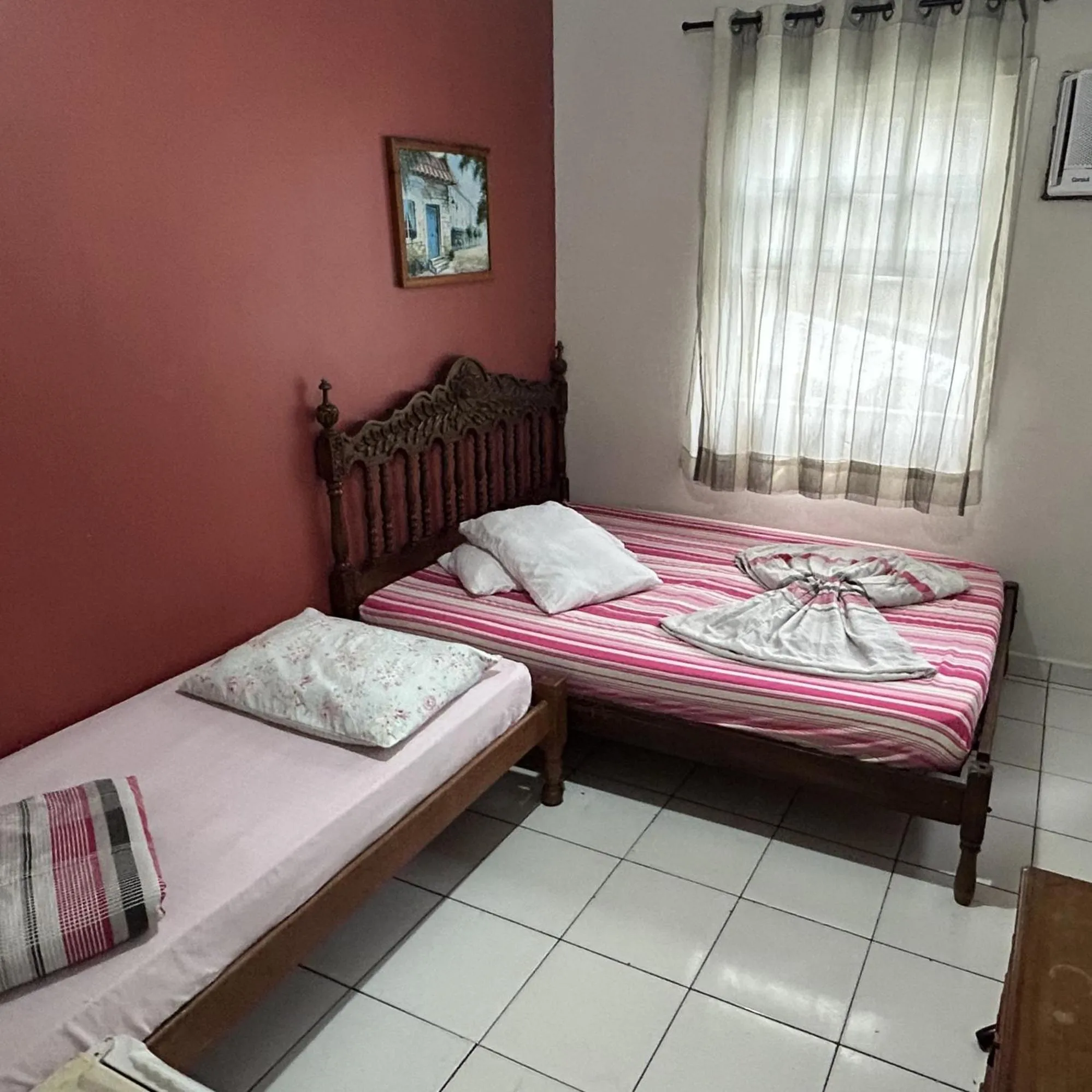 Bed in Pousada Orquidário