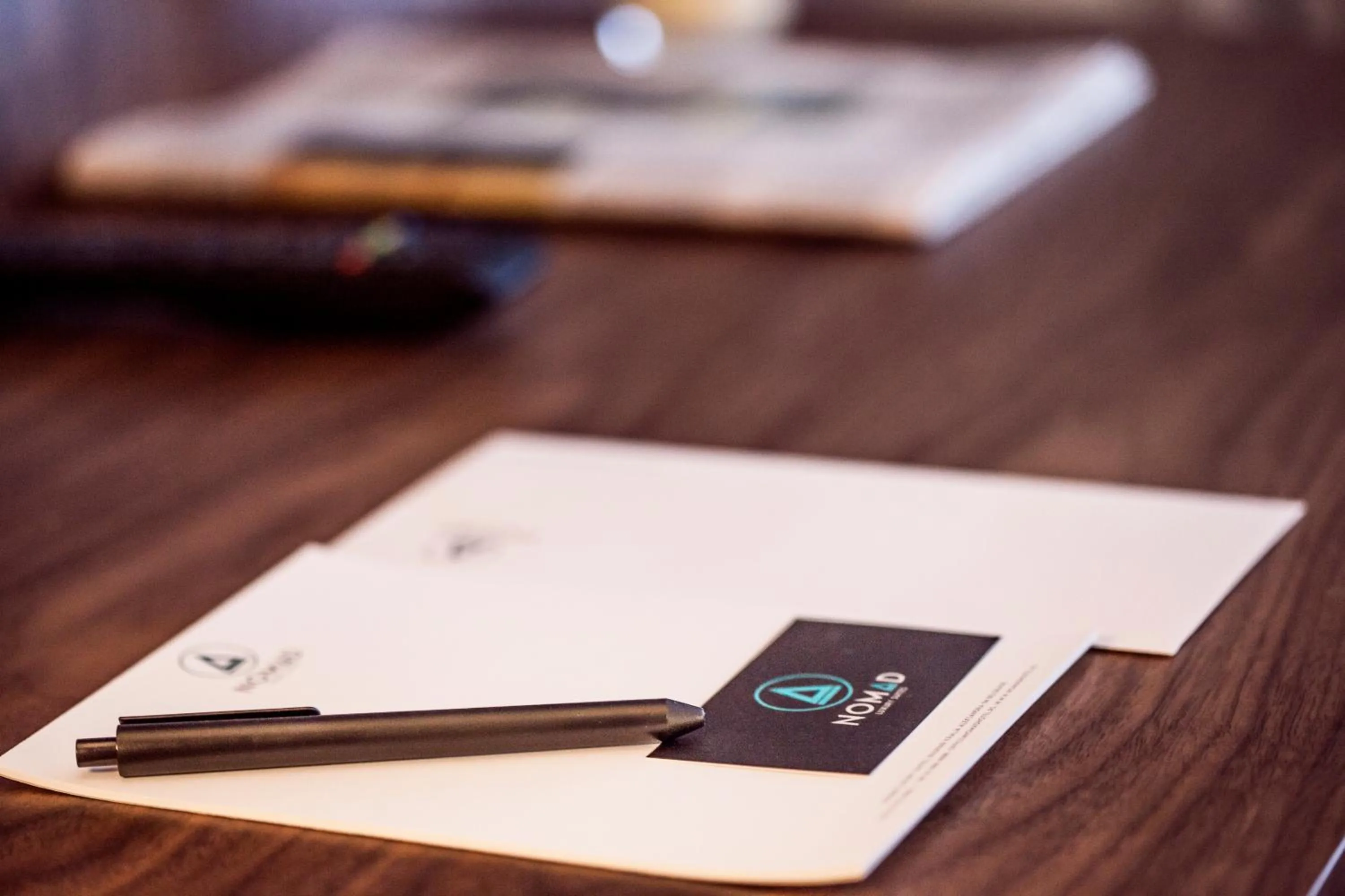 Property logo or sign in Nomad Luxury Suites