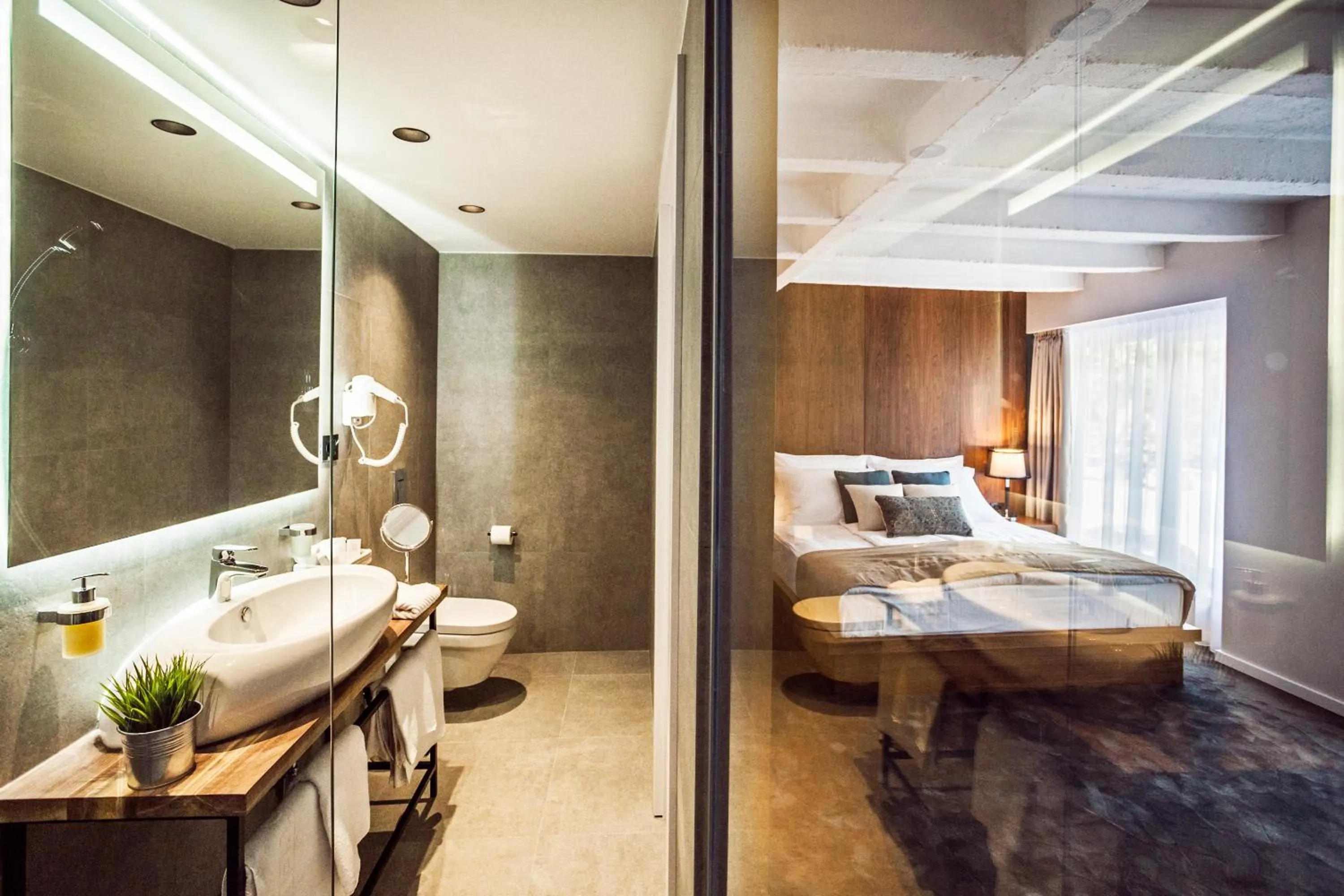 Shower, Bed in Nomad Luxury Suites