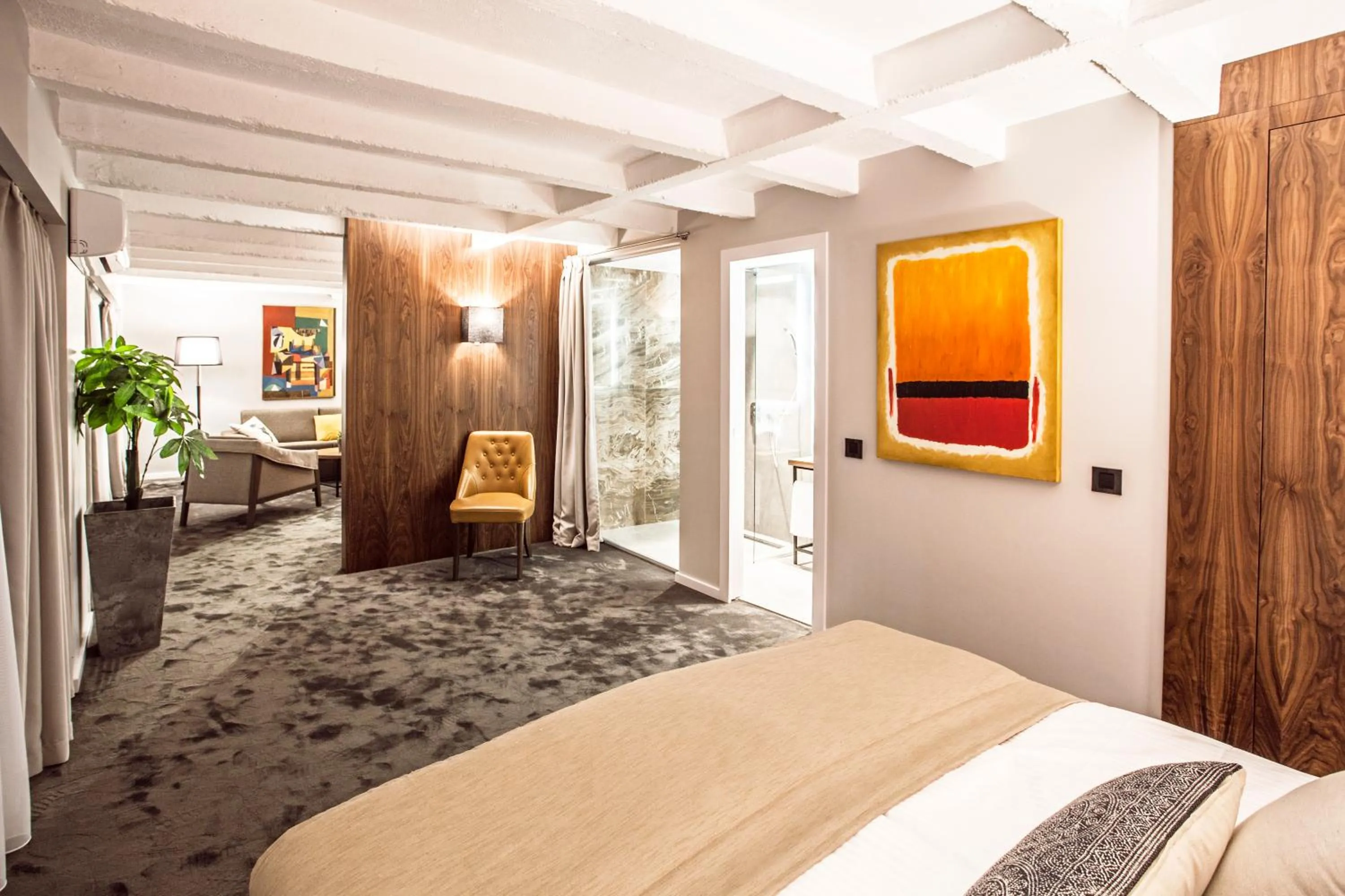 Shower, Bed in Nomad Luxury Suites