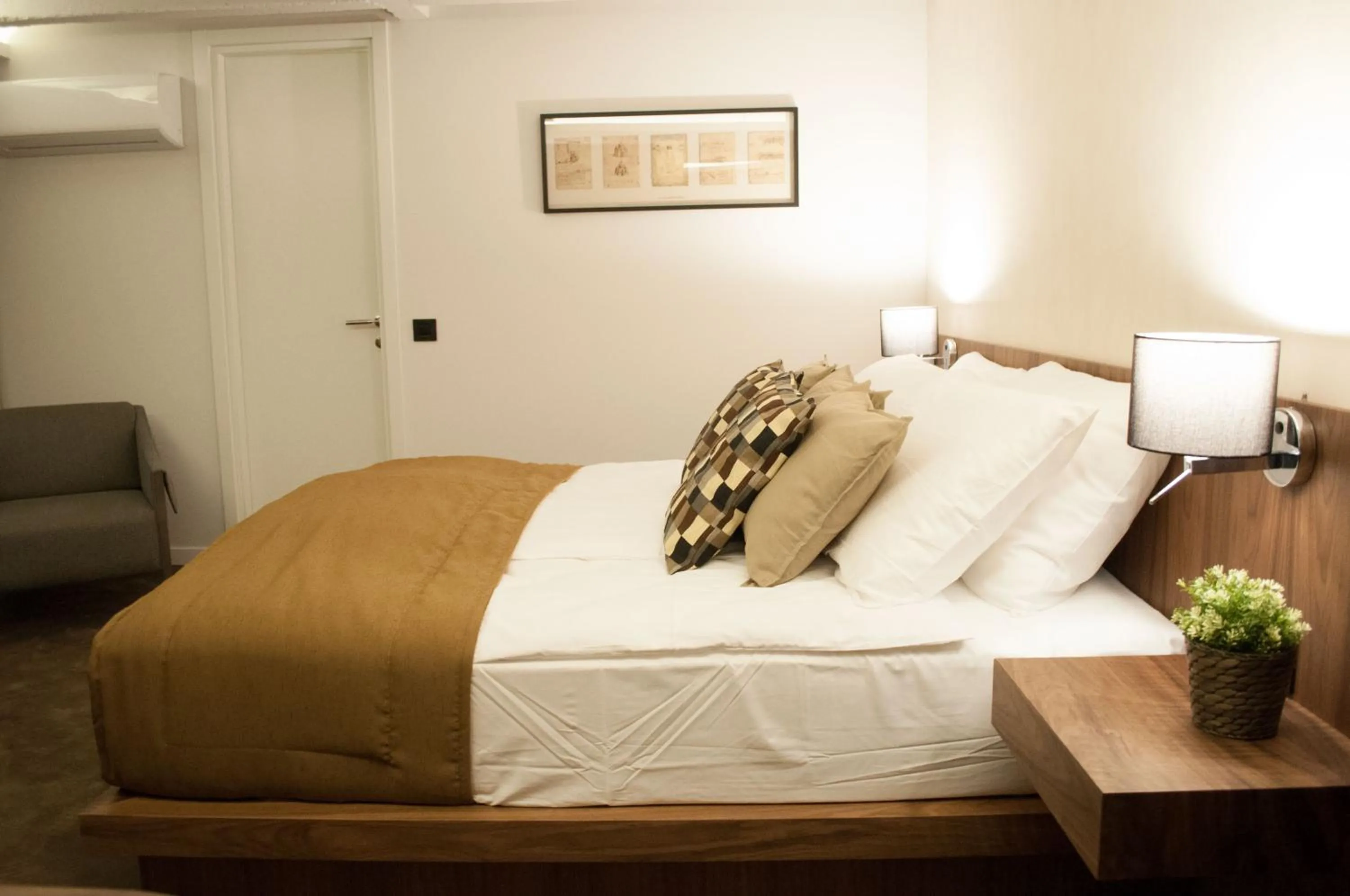 Bed in Nomad Luxury Suites