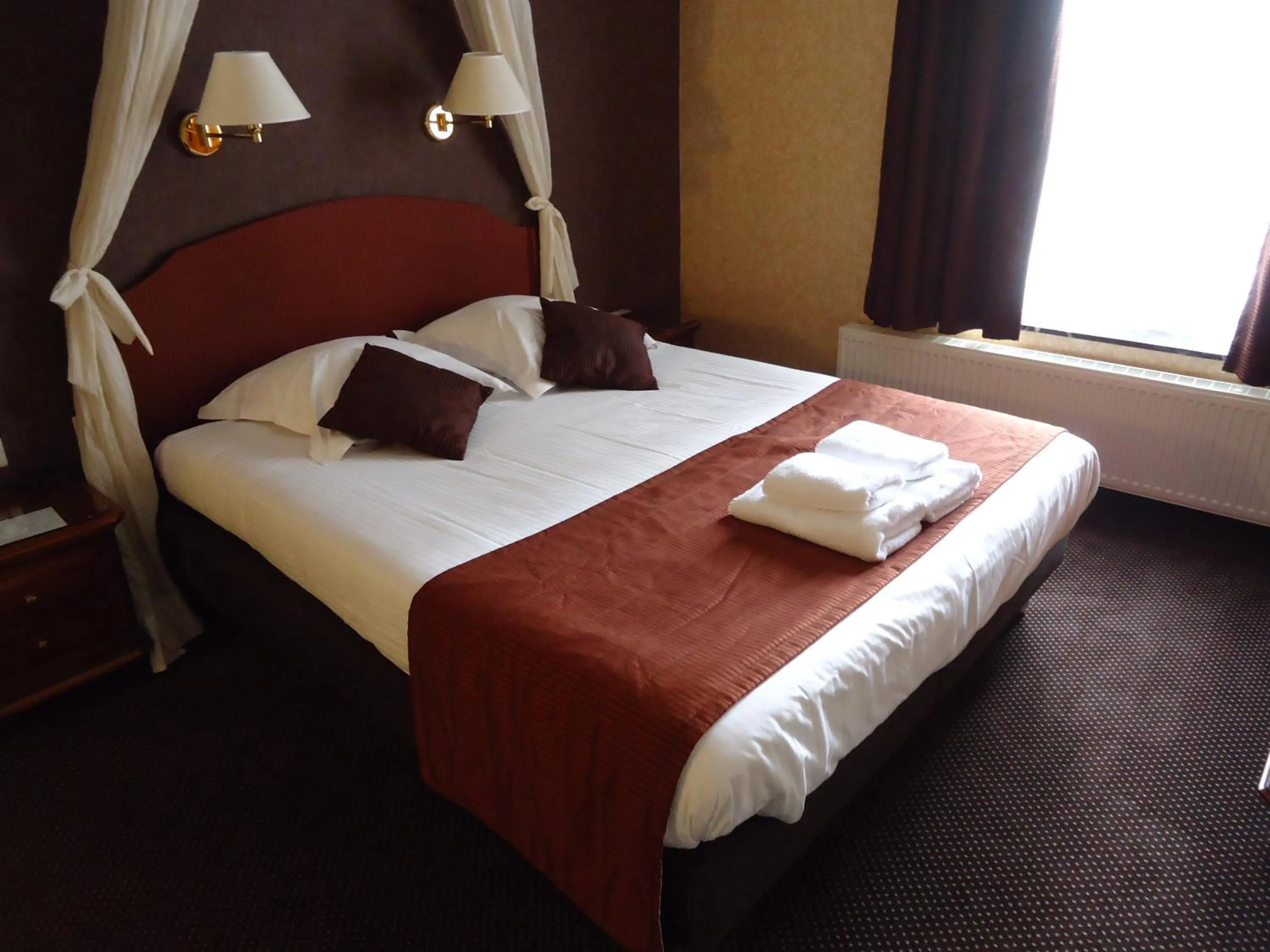 Bed in Hotel Groeninghe