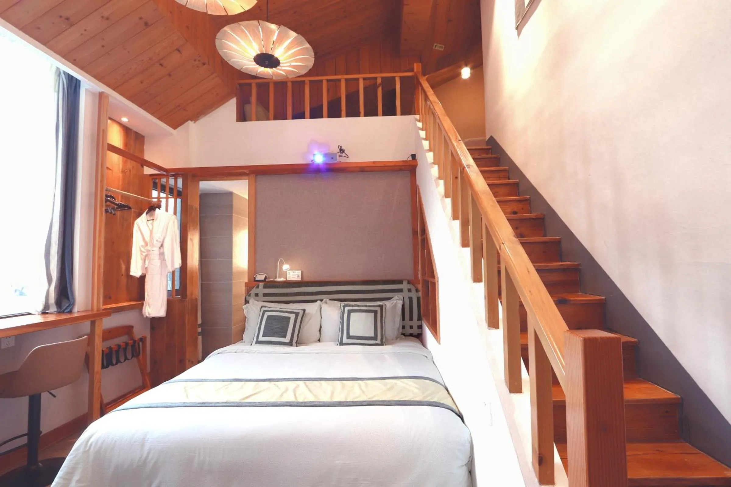 Bed in Mild Spring Boutique Hotel