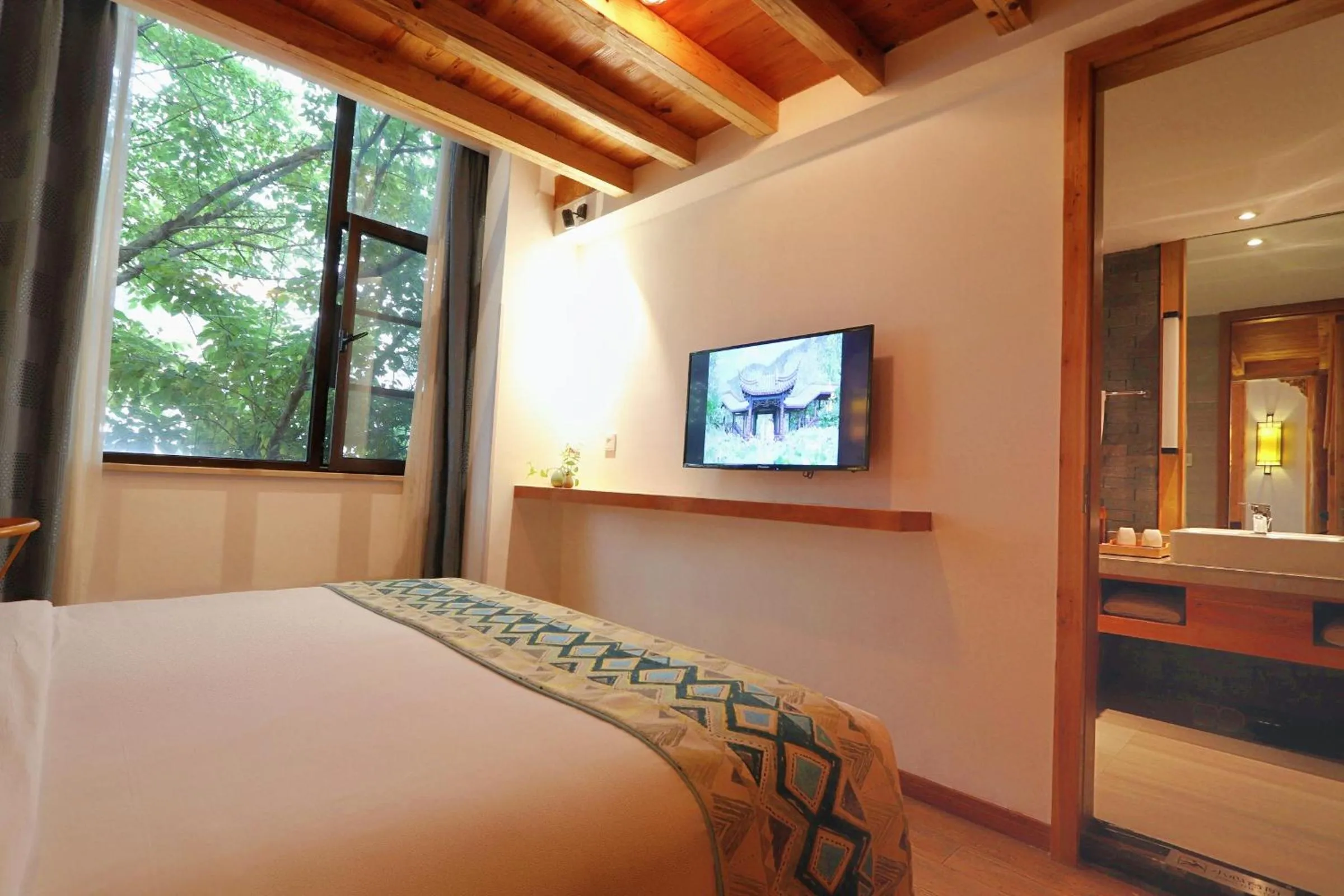 View (from property/room), Bed in Mild Spring Boutique Hotel